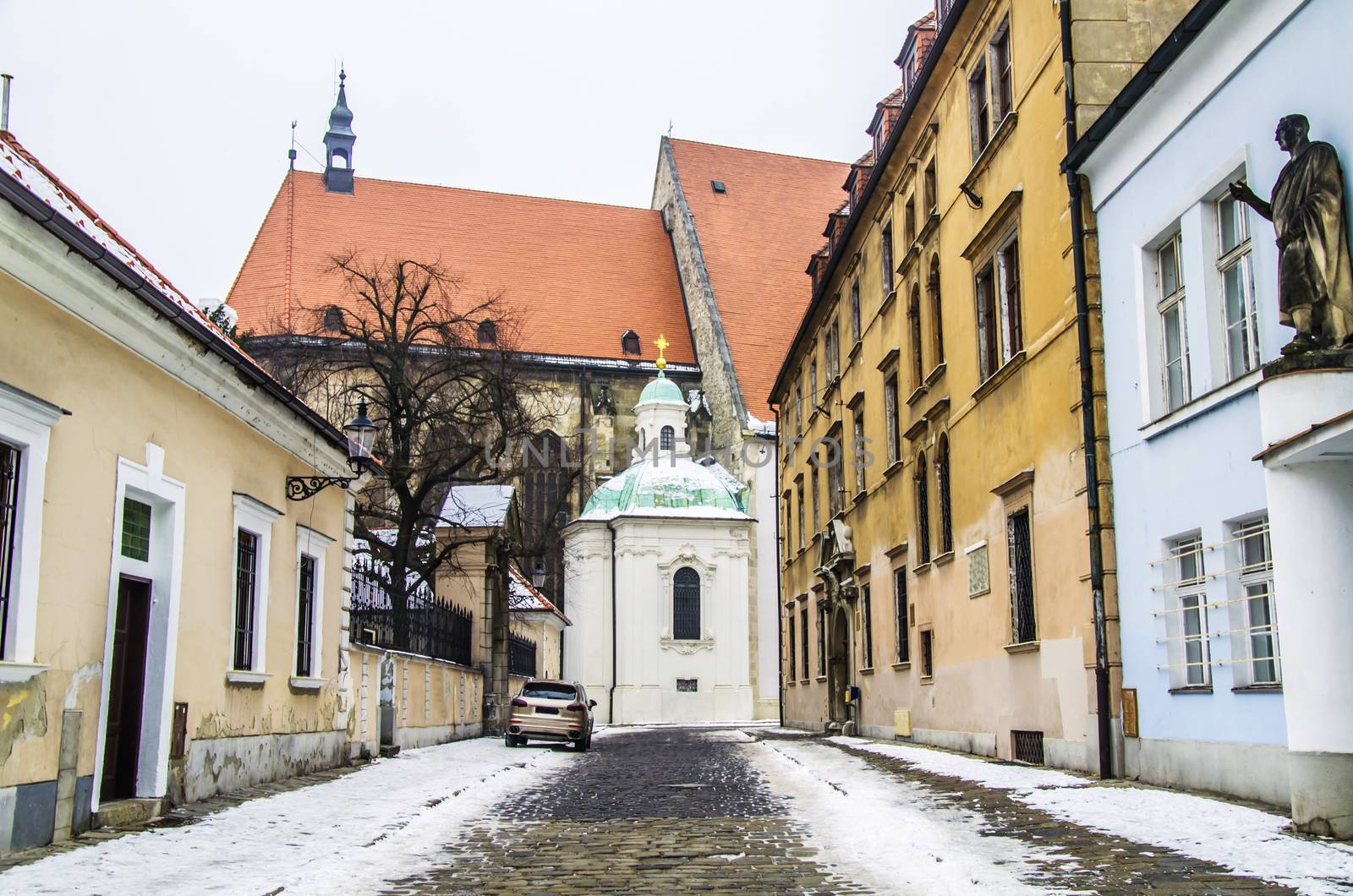 historic helmet of Bratislava street nevada and church background