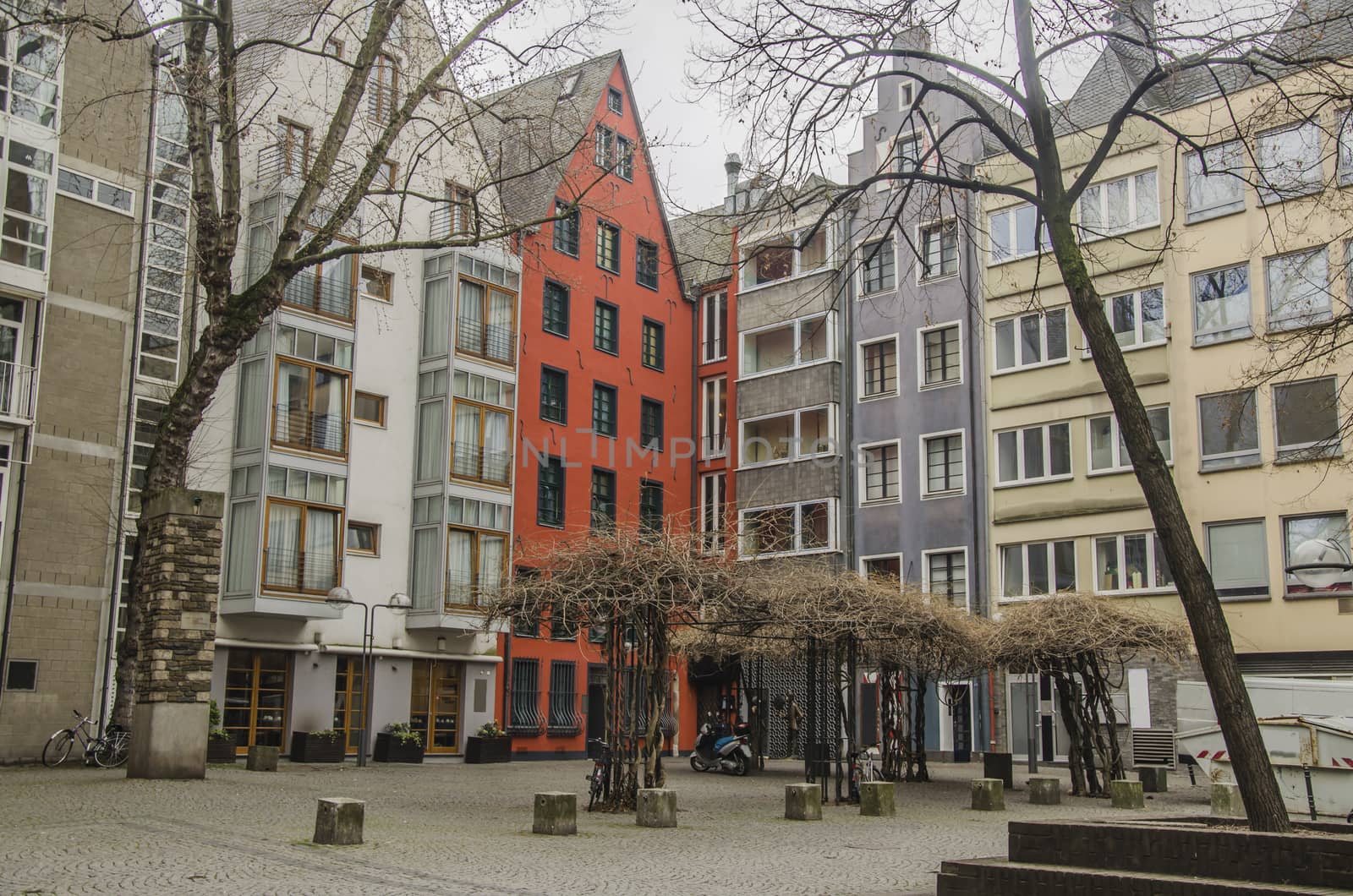 city of cologne a space of peace in the center of the city multicolored buildings surround an inner square
