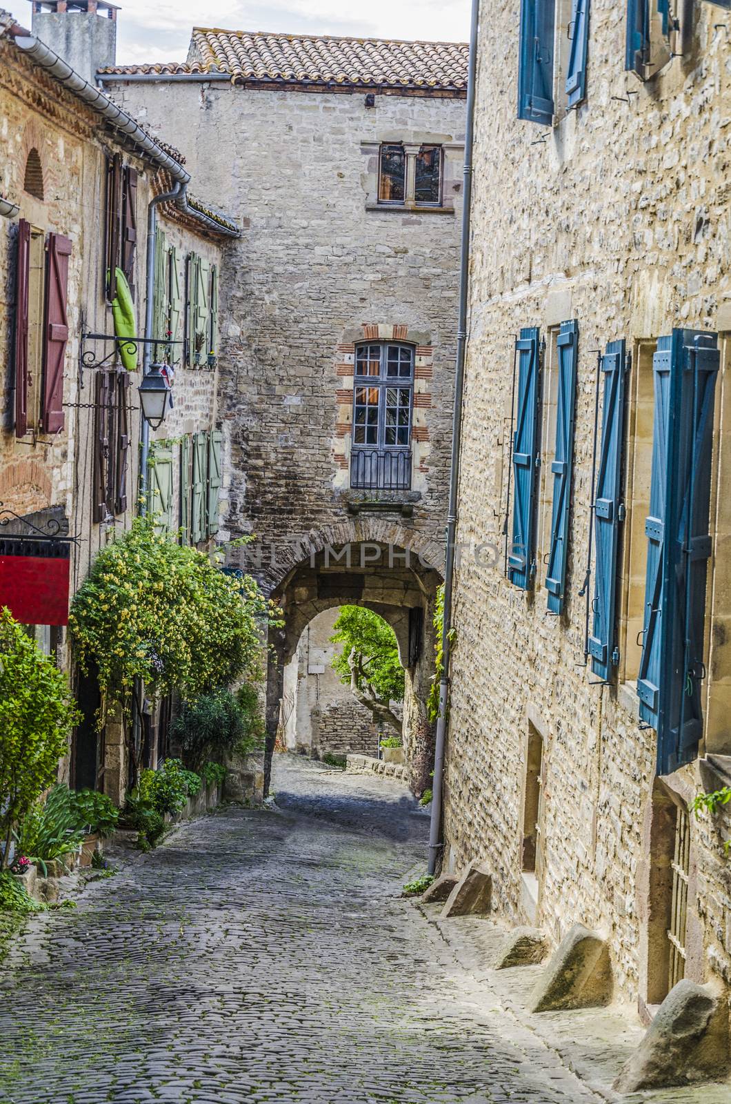 One of the medieval streets of the village of Cordes sur Ciel located in France in the midi pyrenees region