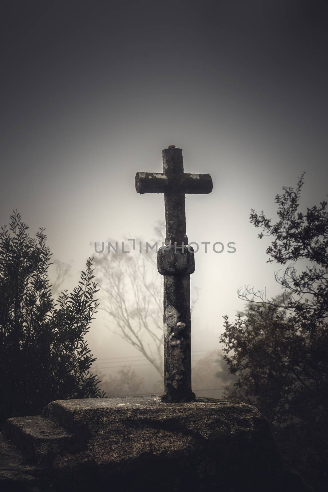 Religious stone cross by Iko