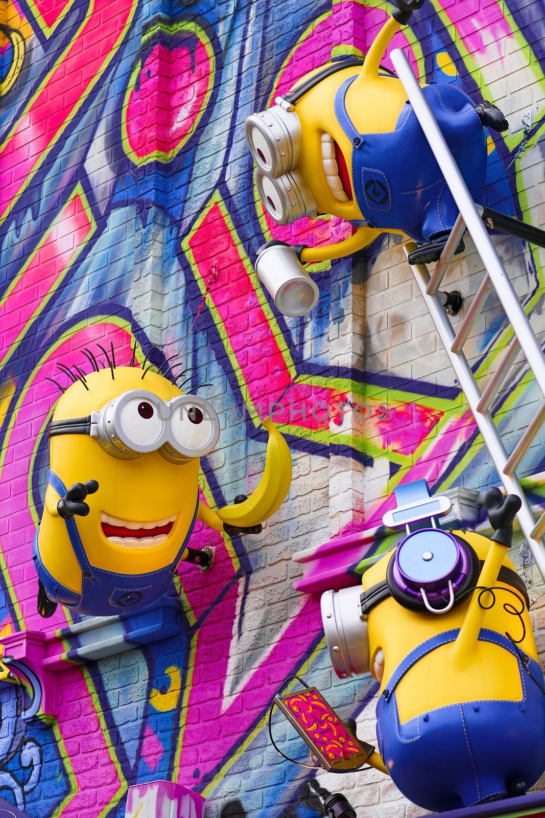 OSAKA, JAPAN - Nov 13, 2019 : Close up of HAPPY MINION statue in Universal Studios Japan. Minions are famous character from Despicable Me animation.