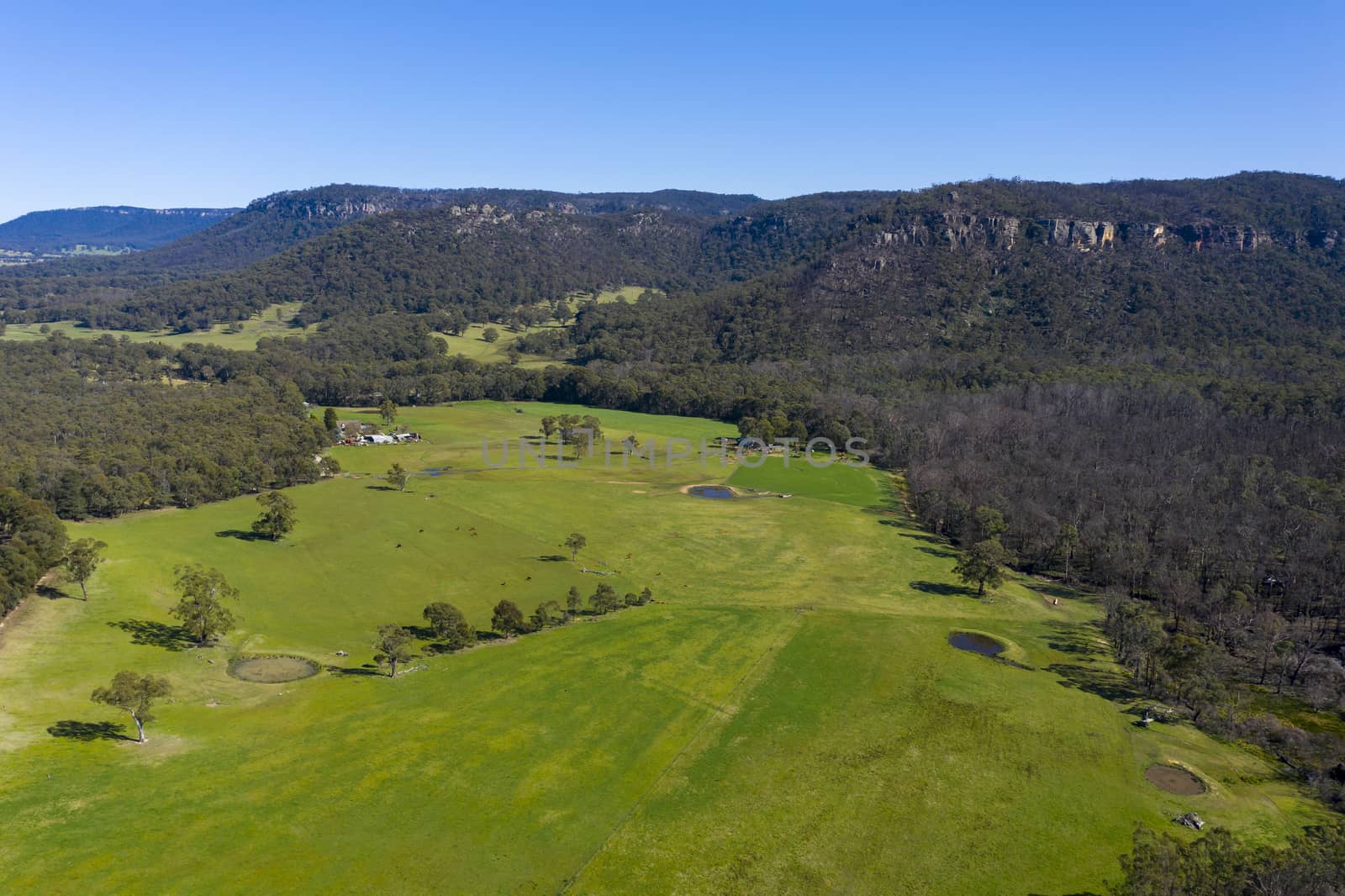 A lush green agricultural valley in The Blue Mountains in regional New South Wales in Australia