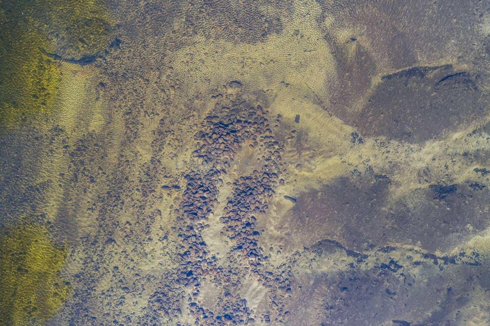 Aerial view of sand patterns in a river bed in regional Australia by WittkePhotos