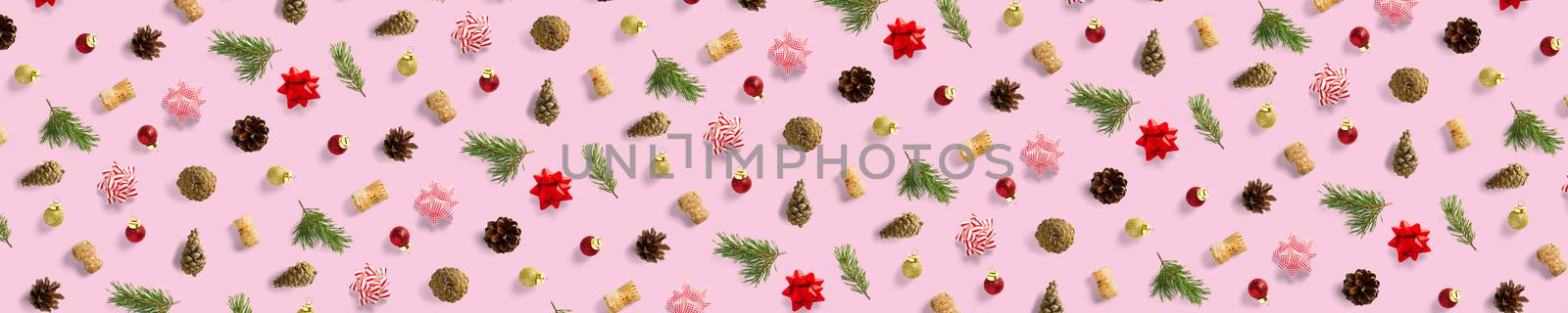 modern christmas background on pink backdrop. creative flat lay for christmas time, banners, posters, prints and other creative works. not seamless pattern