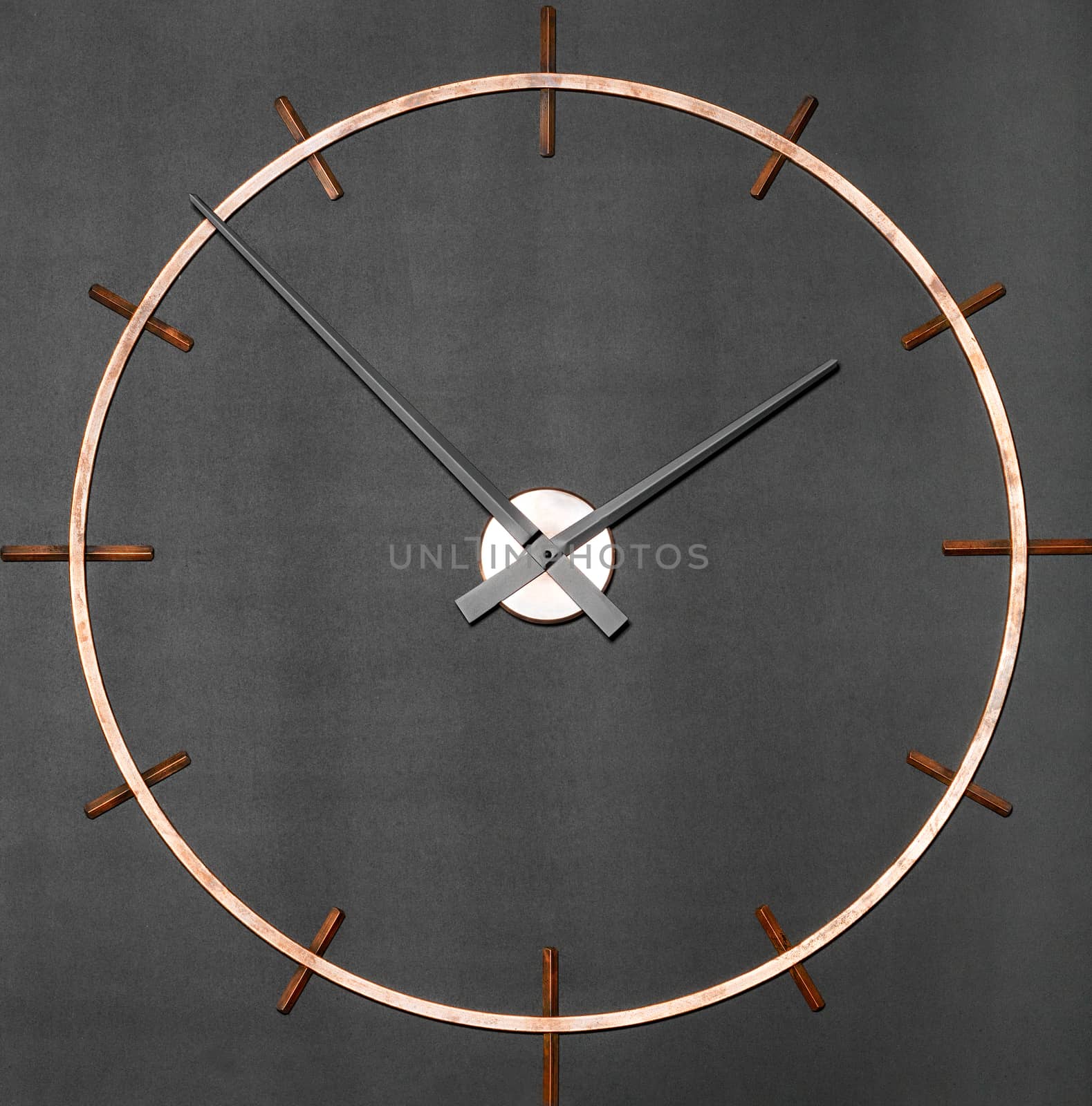 Unusual industrial brass wall clock on a granite black background. by Sergii