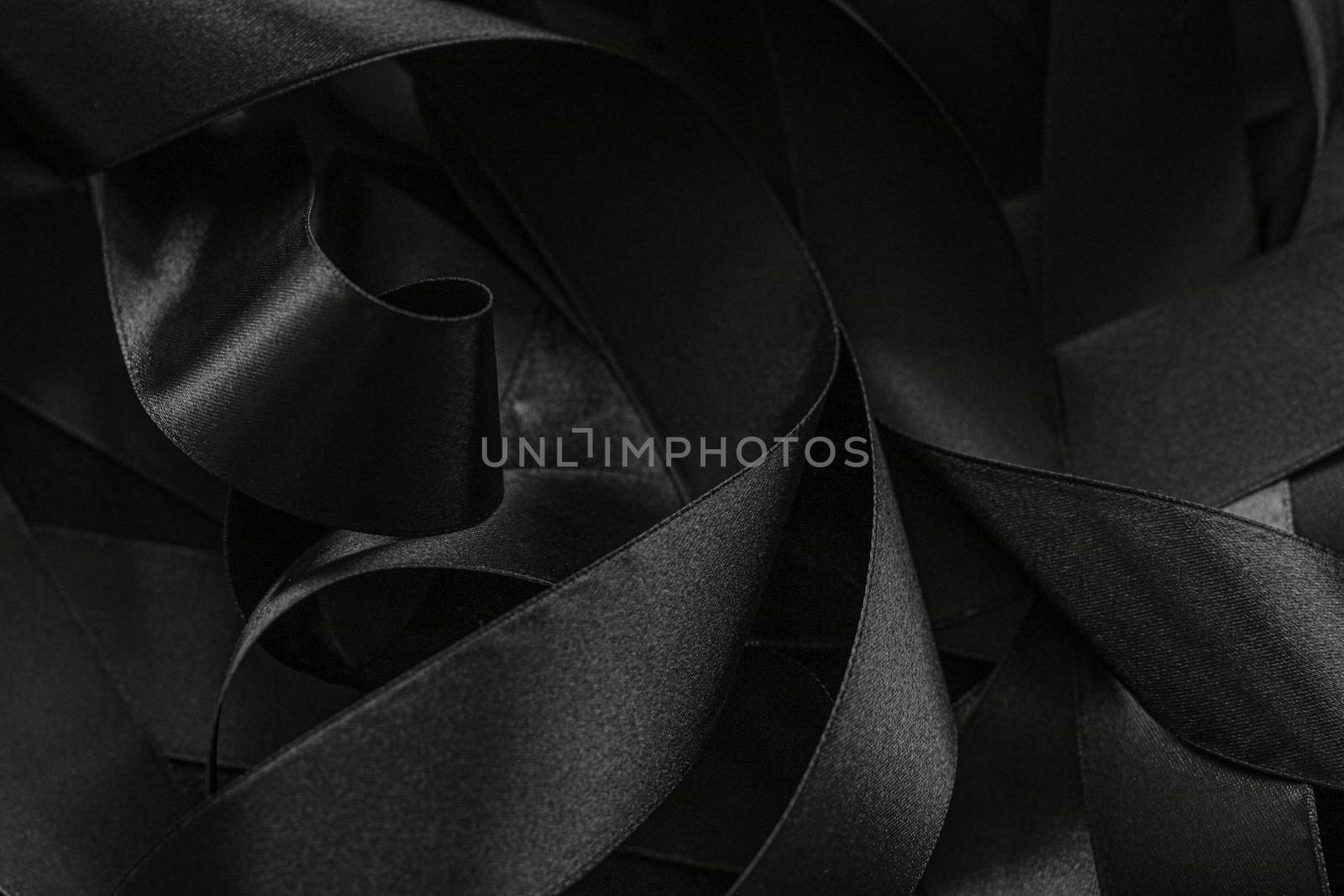 Black silk ribbon as background, abstract and luxury brand designs