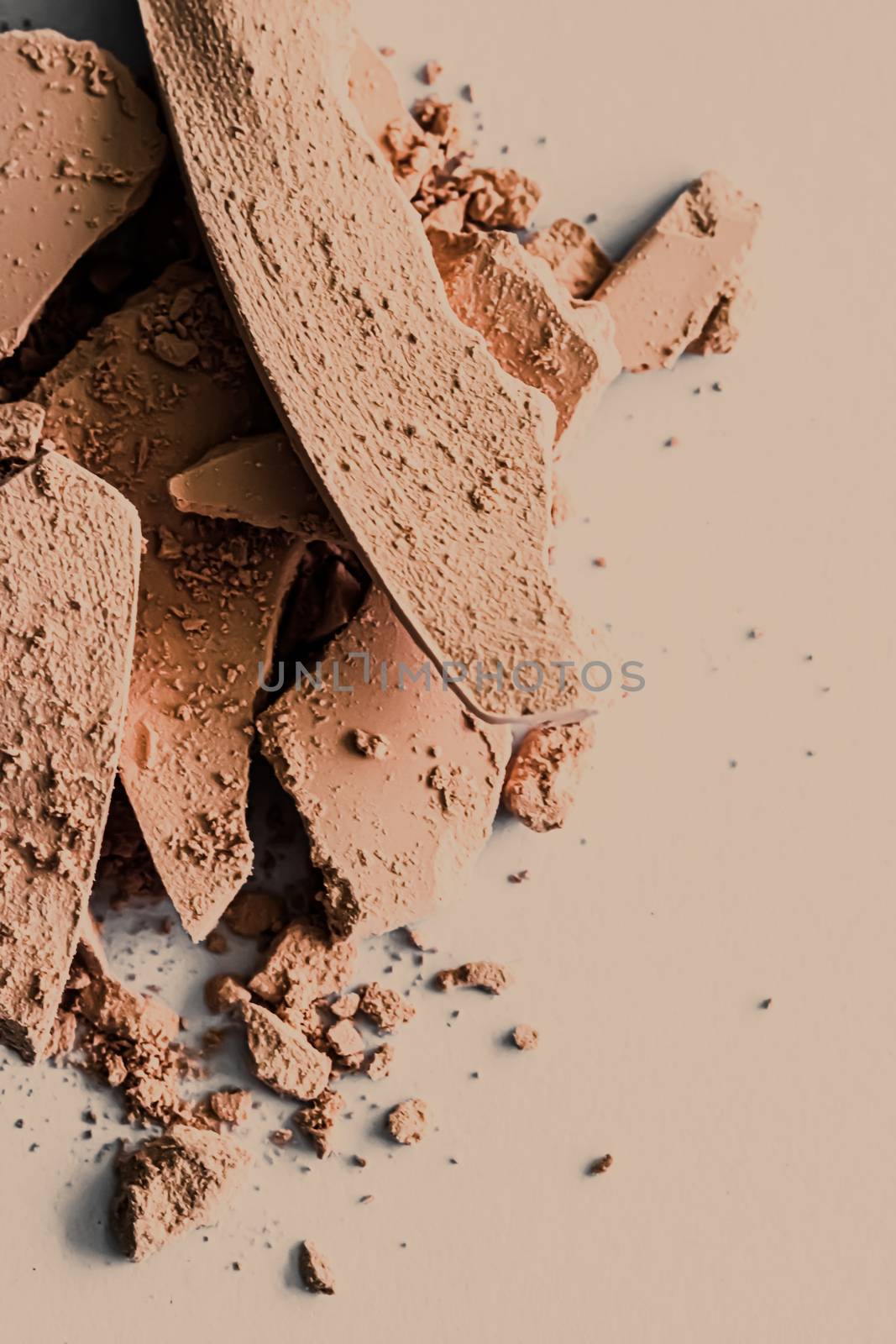 Beige eye shadow powder as makeup palette closeup, crushed cosmetics and beauty textures
