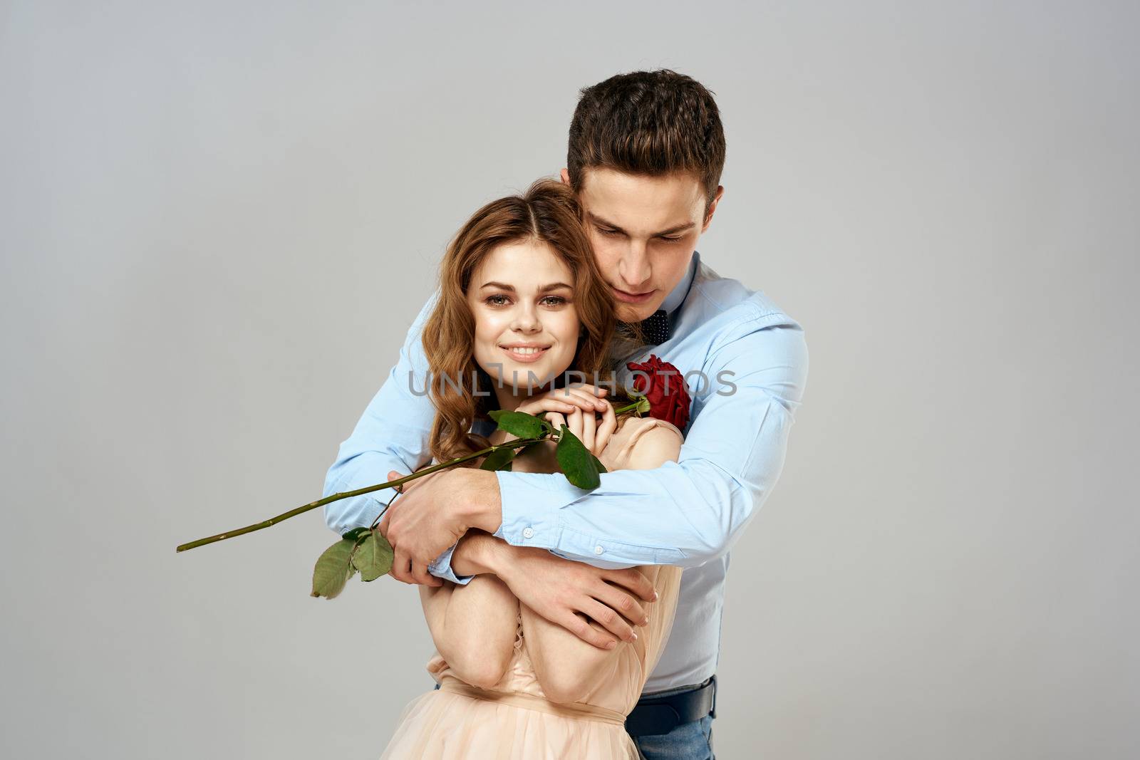 man giving woman roses relationship charm lifestyle embrace lifestyle. High quality photo