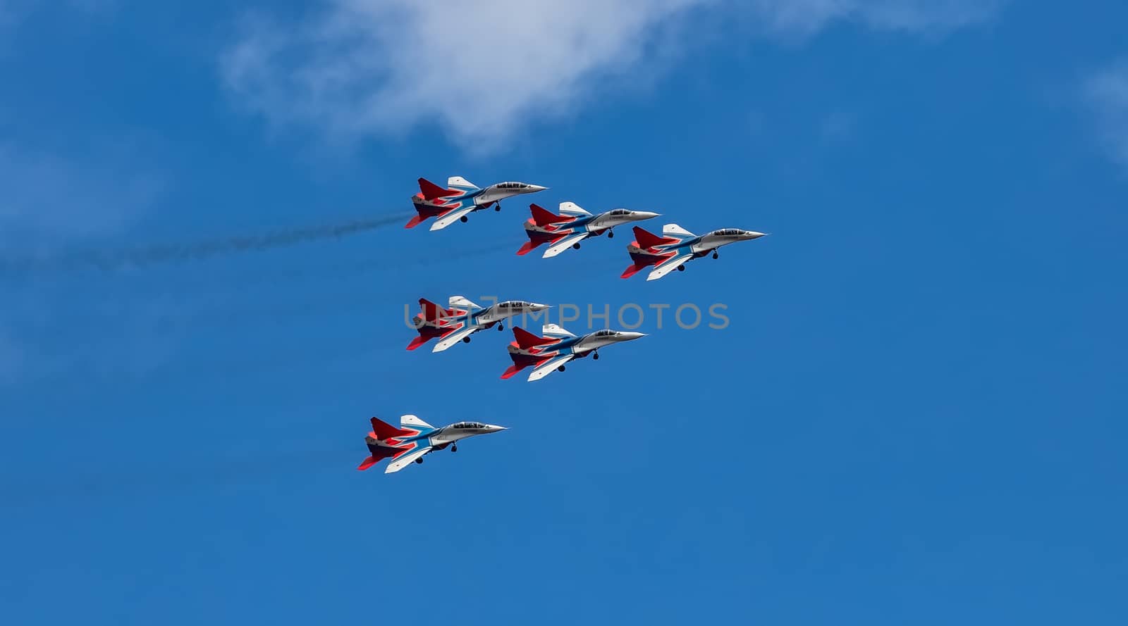 MIG-29 fighter jet squadron flying during aeroshow by DamantisZ