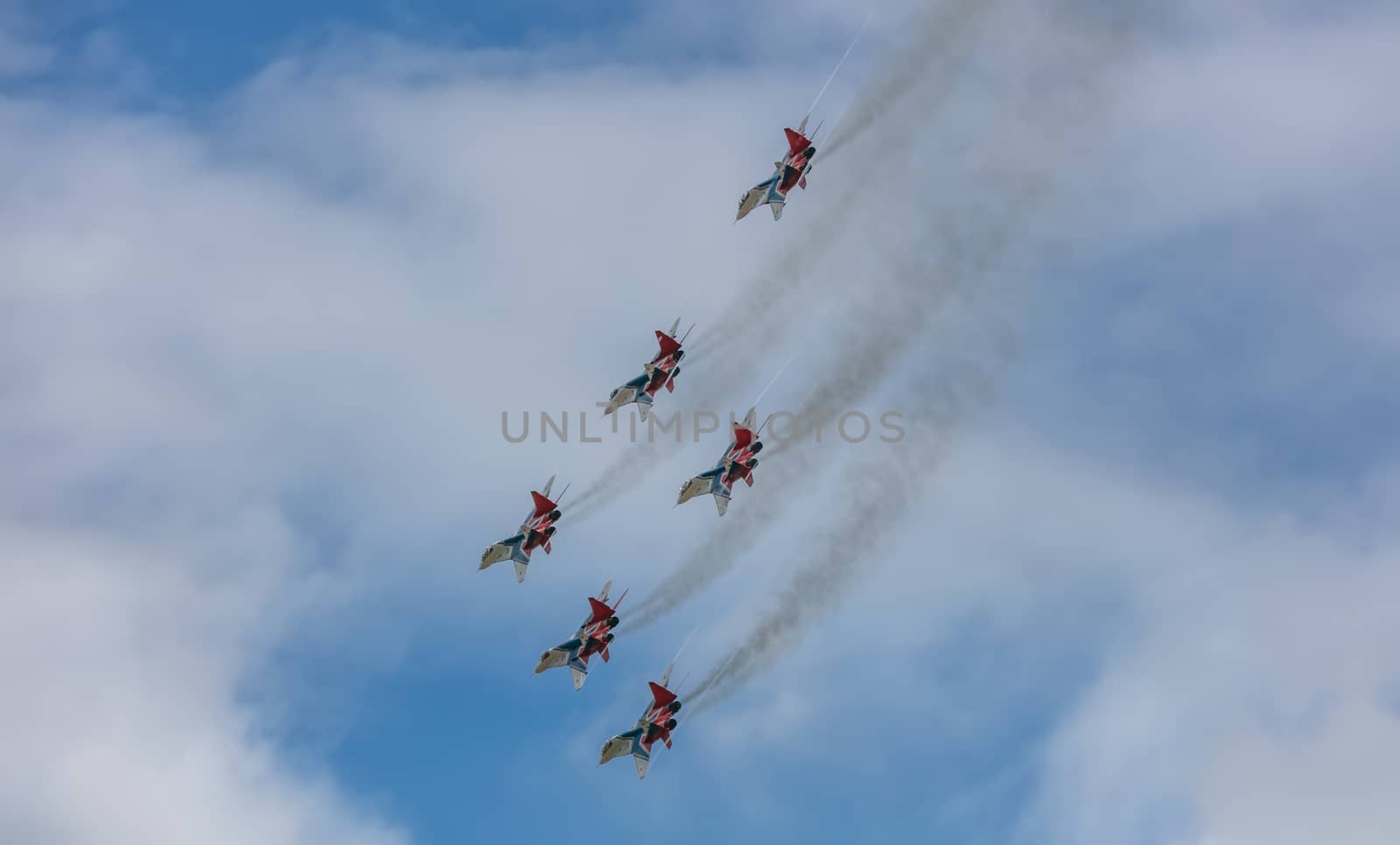 MIG-29 fighter jet squadron flying during aeroshow by DamantisZ