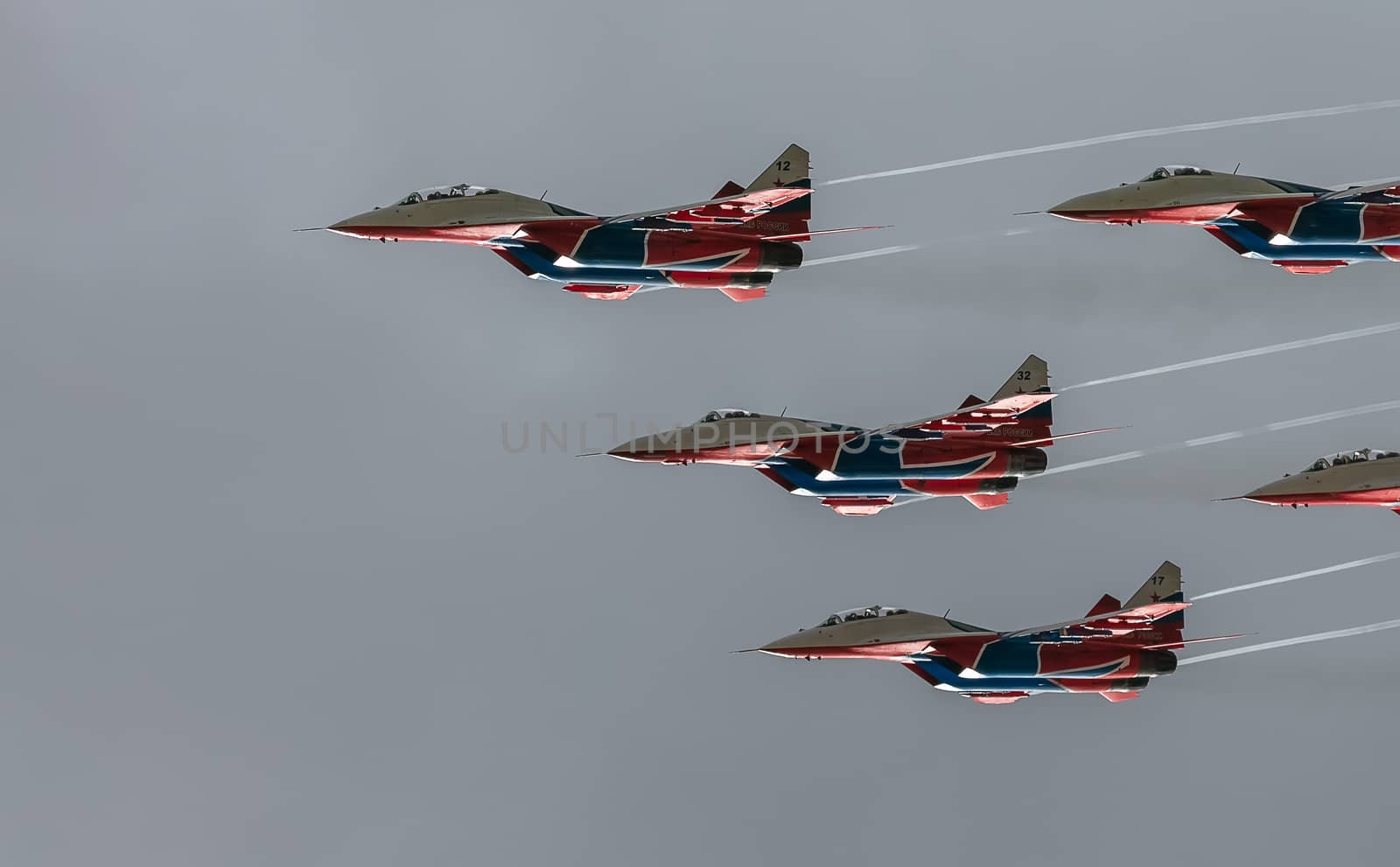 MIG-29 fighter jet squadron flying during aeroshow by DamantisZ