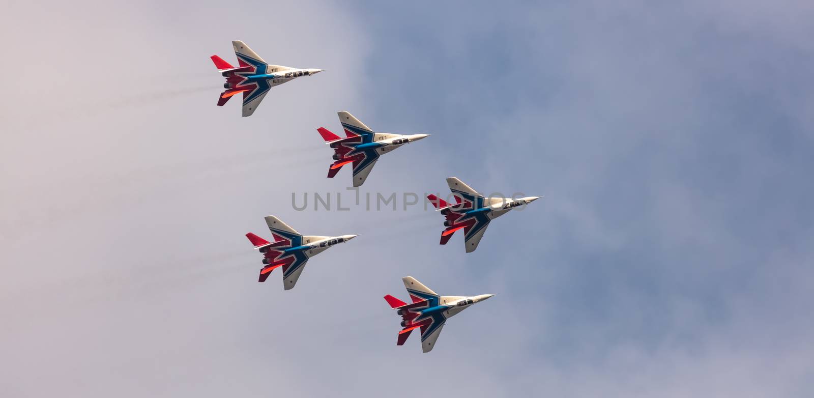 MIG-29 fighter jet squadron flying during aeroshow by DamantisZ