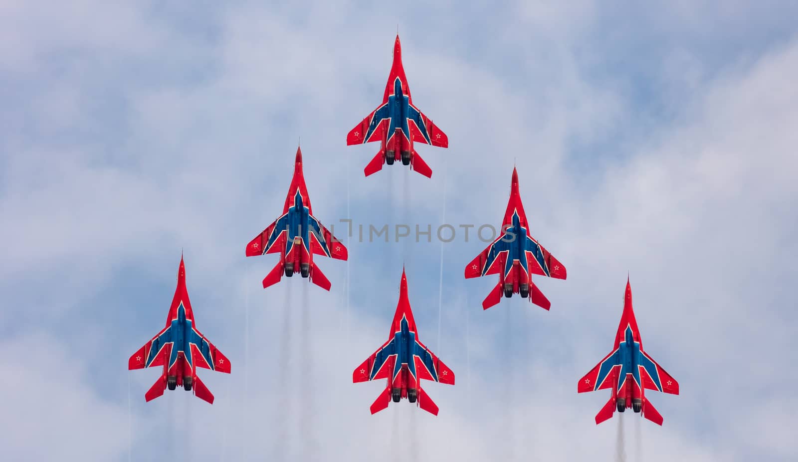 MIG-29 fighter jet squadron flying during aeroshow by DamantisZ