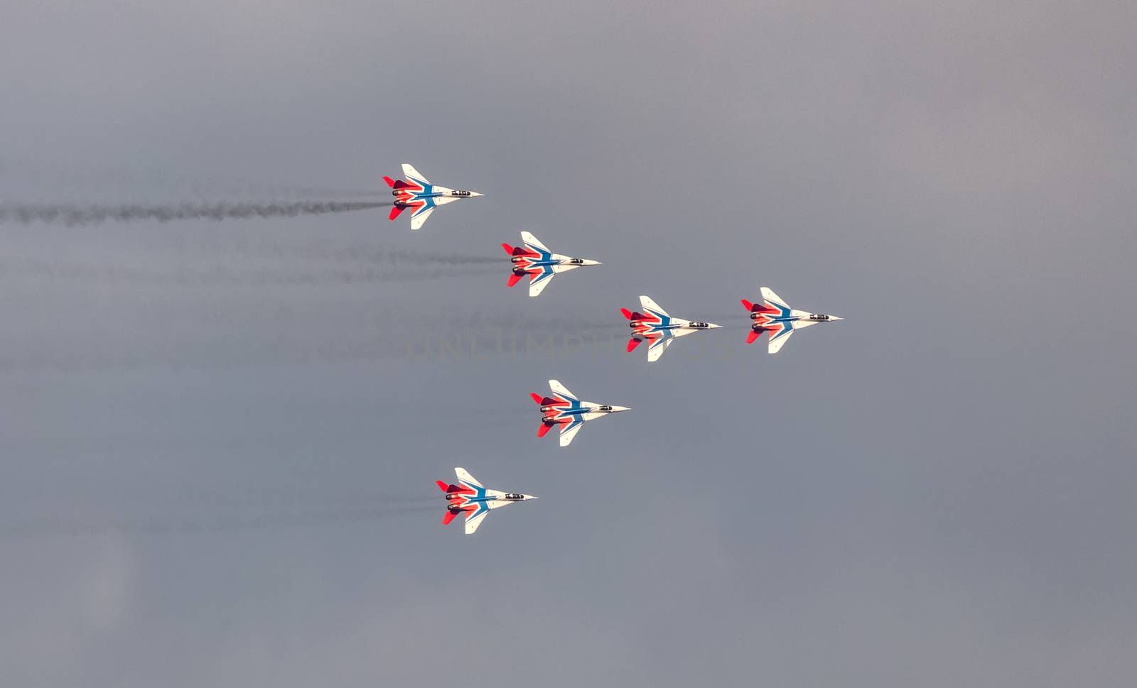 MIG-29 fighter jet squadron flying during aeroshow by DamantisZ