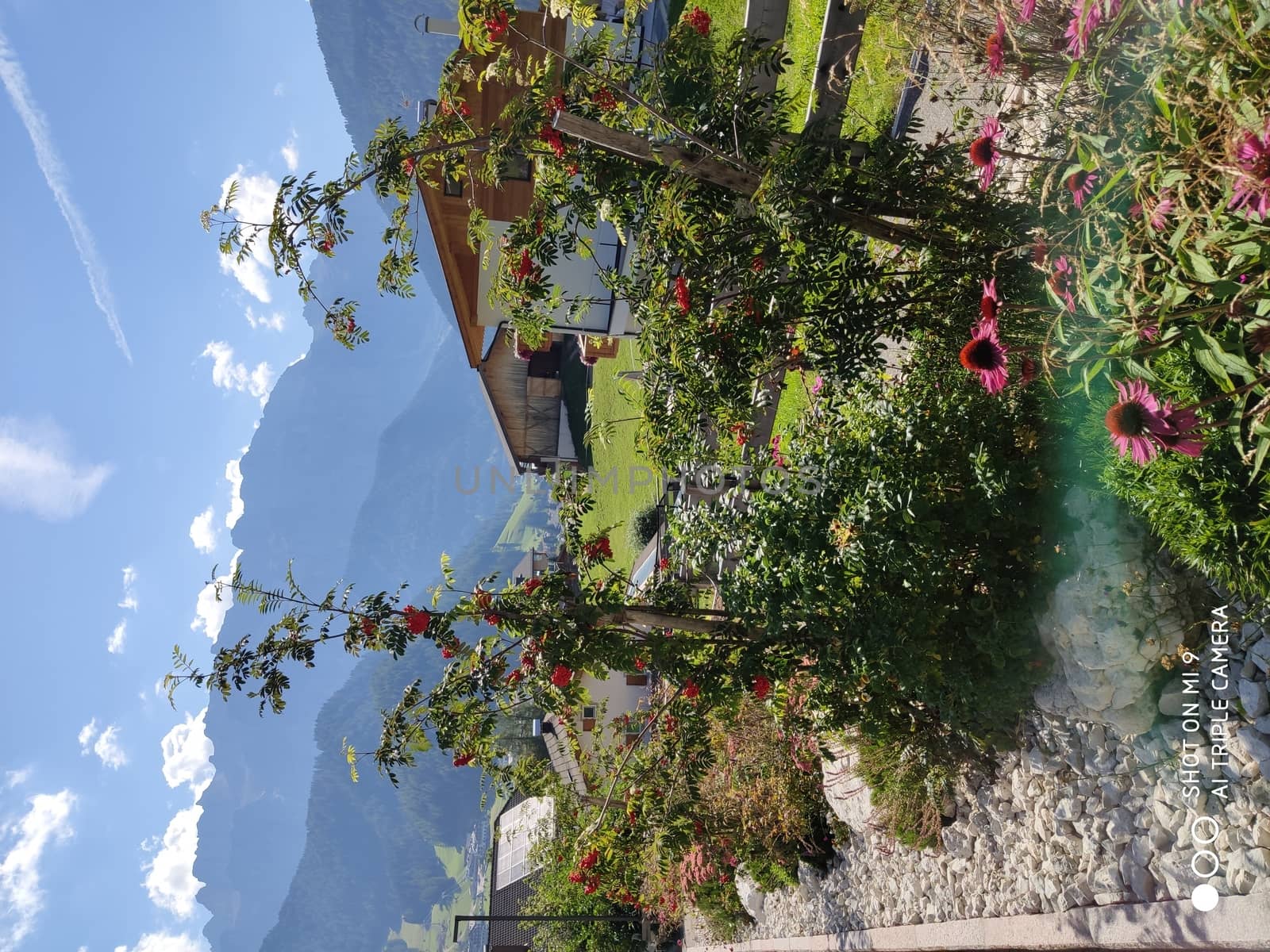 Val Gardena, Italy - 09/15/2020: Scenic alpine place with magical Dolomites mountains in background, amazing clouds and blue sky  in Trentino Alto Adige region, Italy, Europe