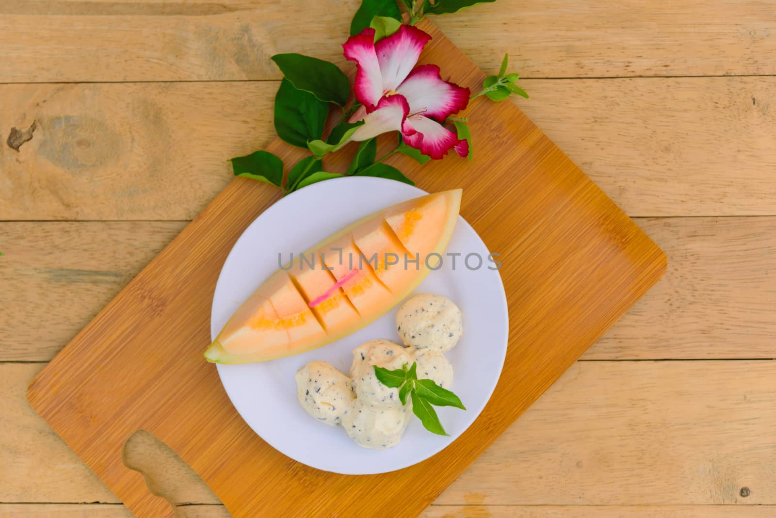 ice cream melon on wood table by rukawajung