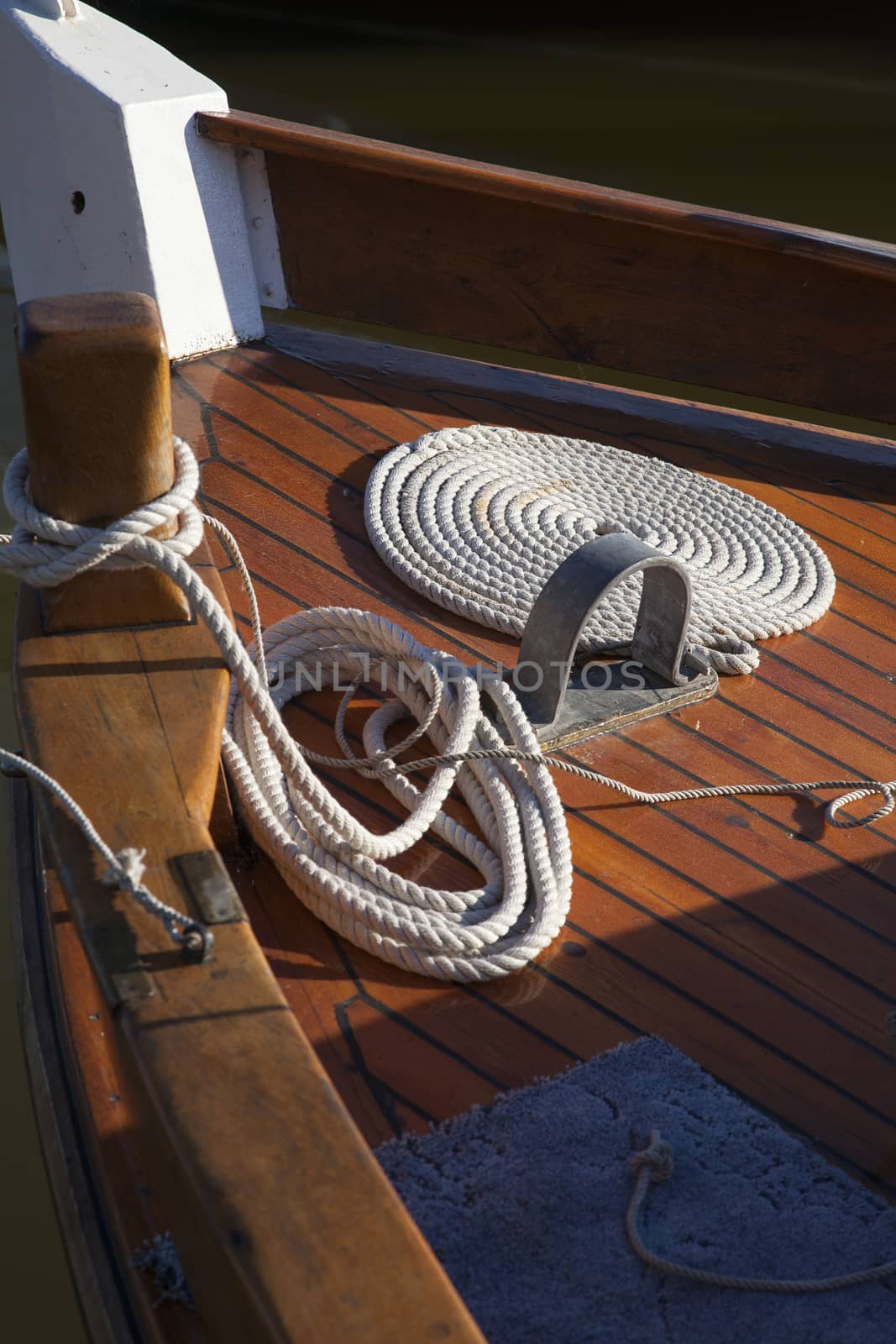 Rope spiral on a wooden boat deck of a sailing ship