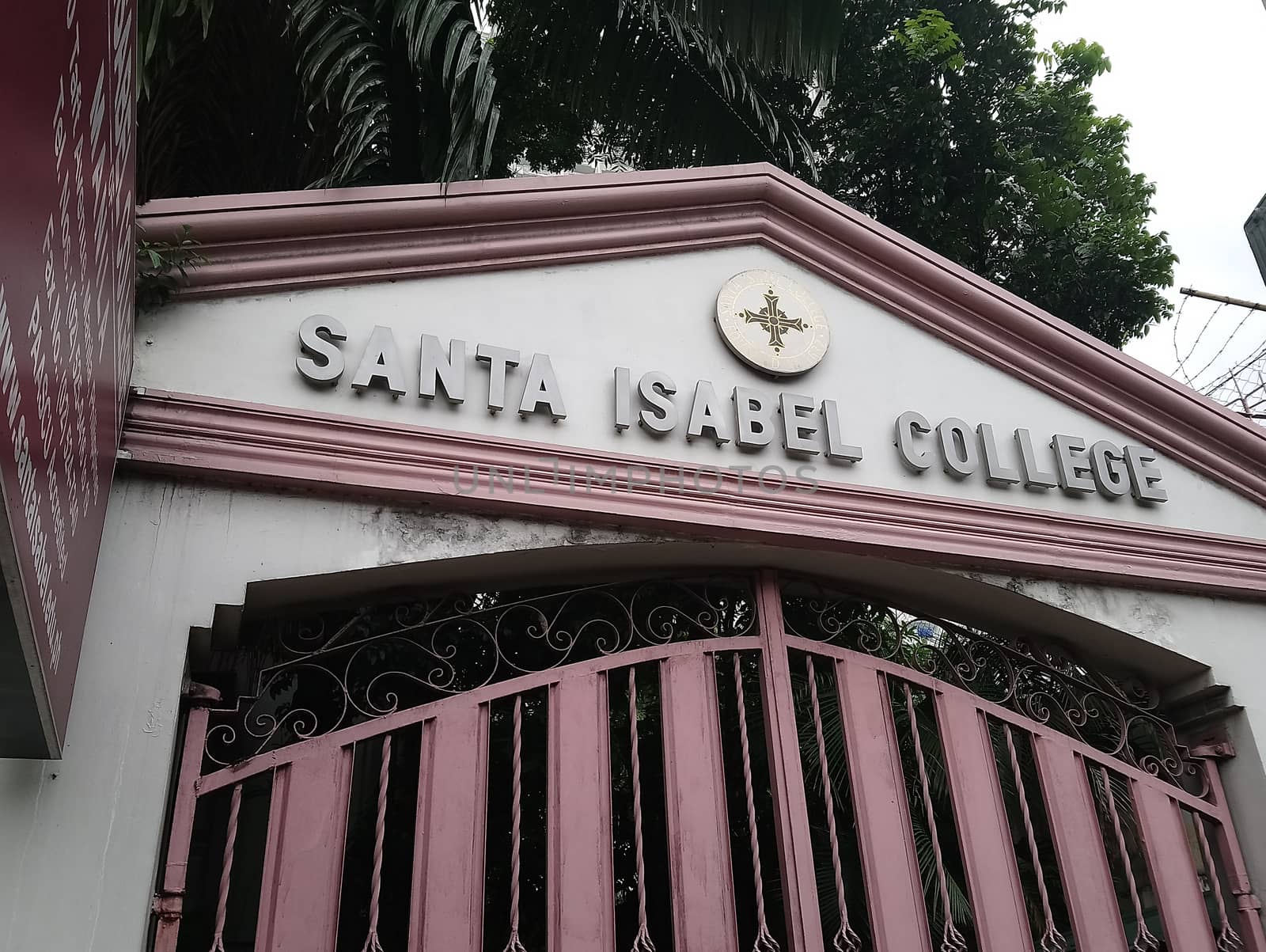 MANILA, PH - JULY 2 - Santa Isabel college sign on July 2, 2018 in Manila, Philippines.