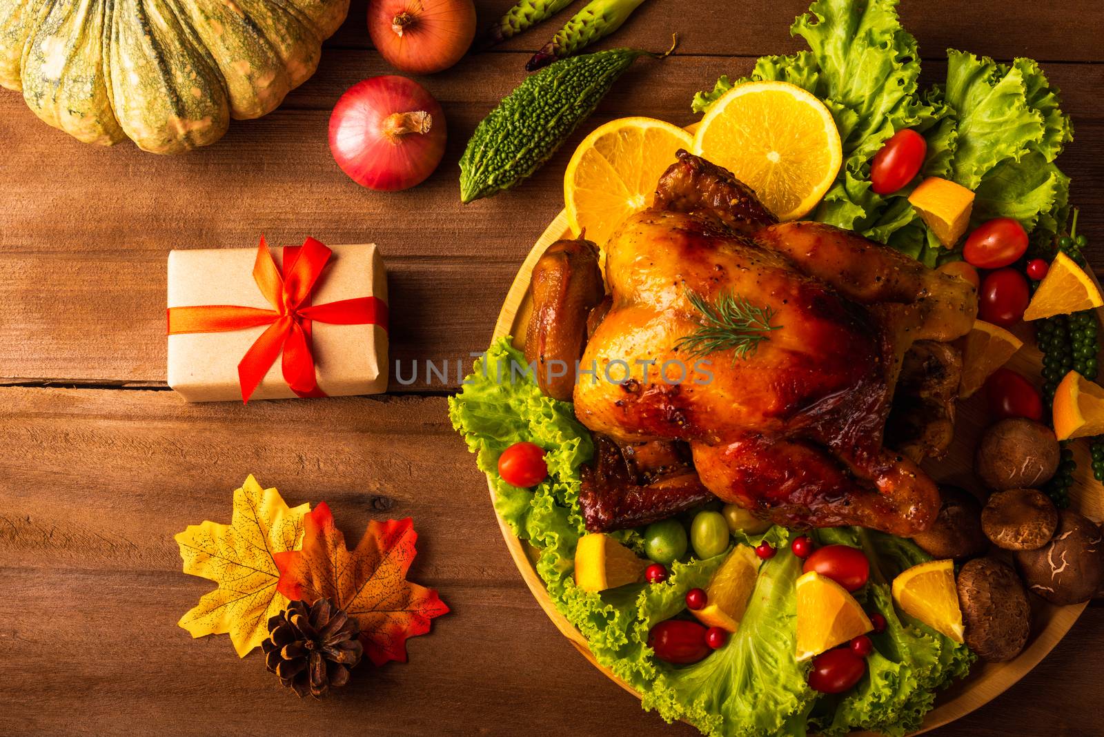 Thanksgiving roasted turkey or chicken and vegetables, Top view Christmas dinner feast food decoration traditional homemade on wooden table background, Happy thanksgiving day of holiday concept