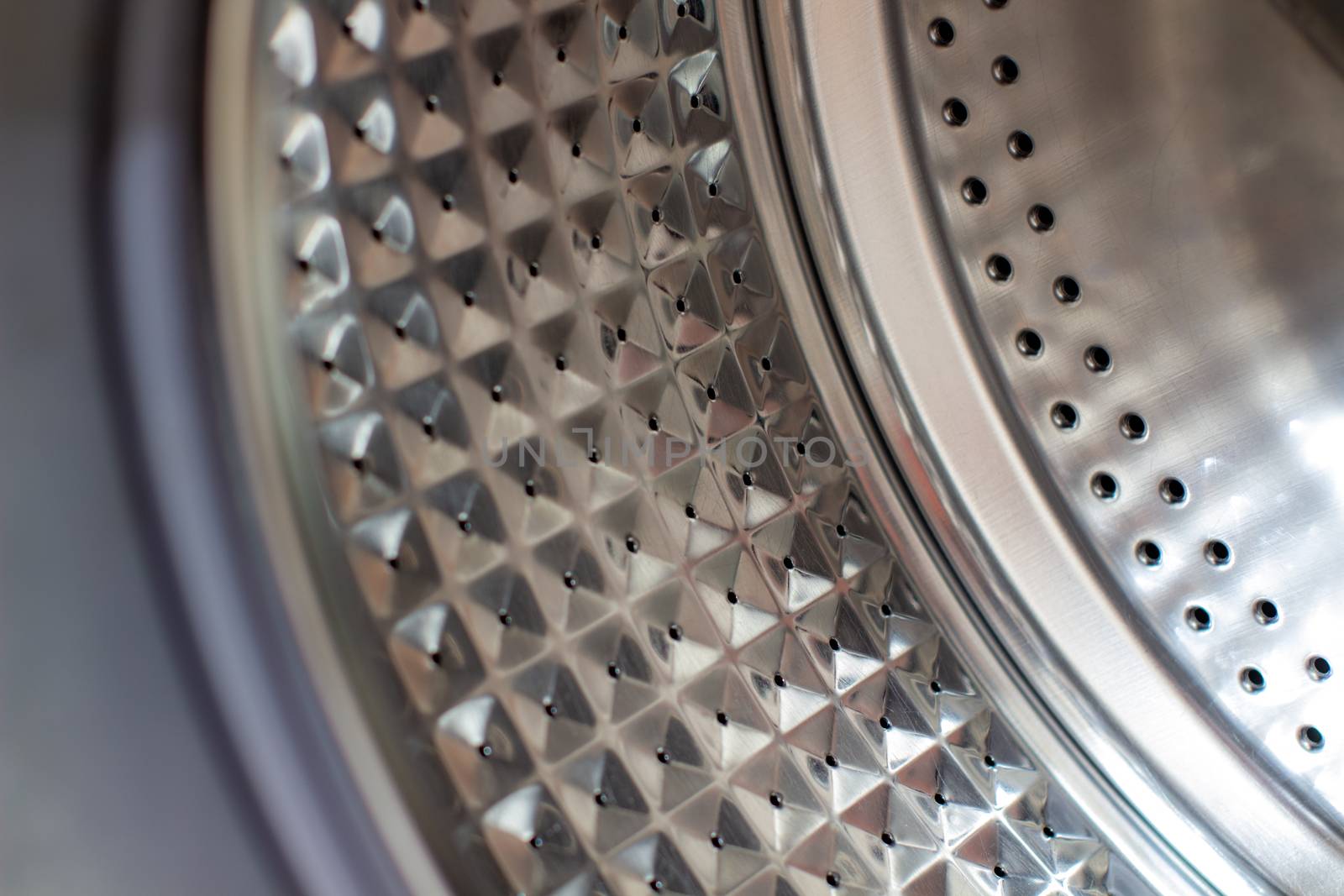 Drum of washing machine dry and clean close-up.Washing Dryer Machine inside view of a drum.
