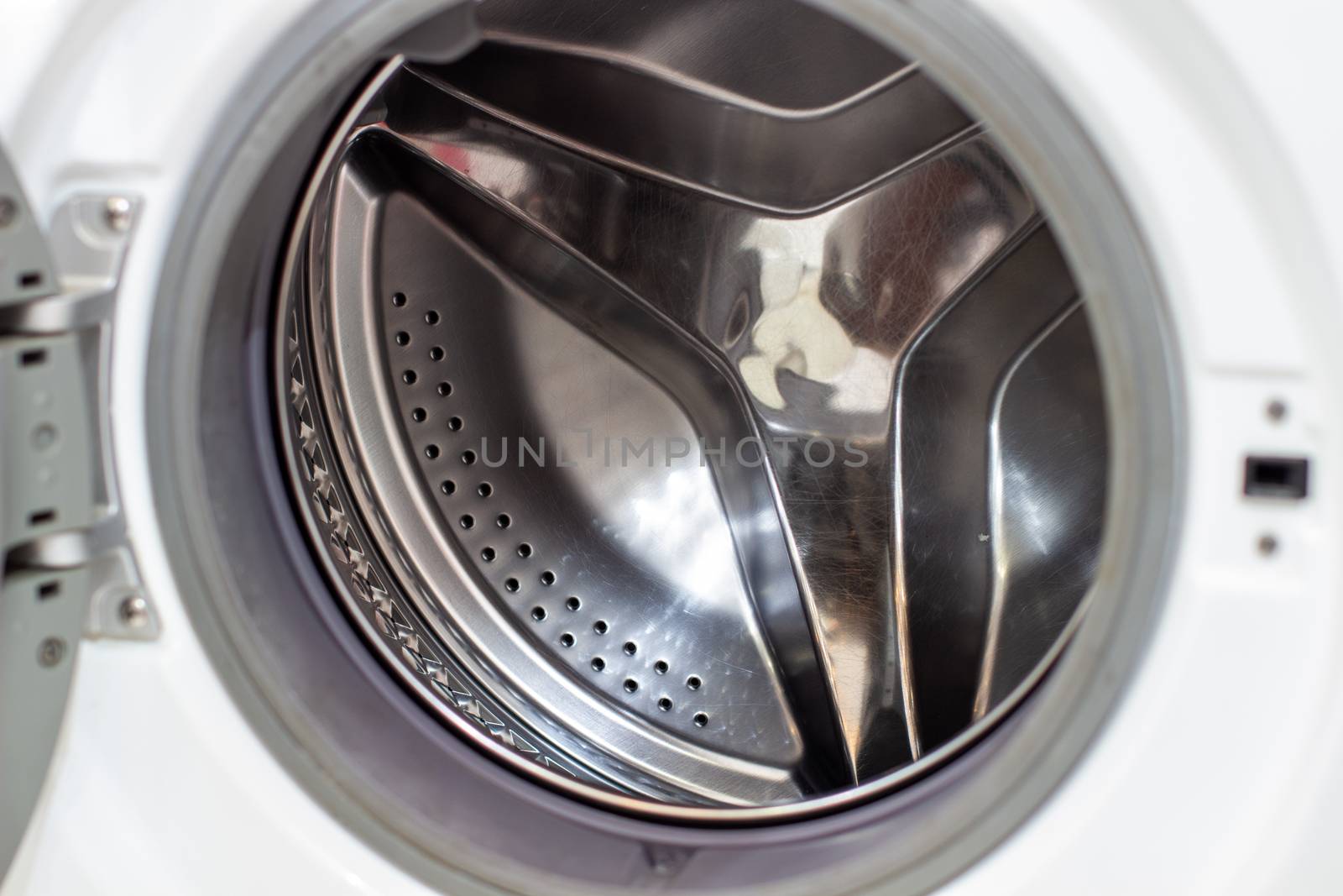 Drum of washing machine dry and clean close-up.Washing Dryer Machine inside view of a drum.