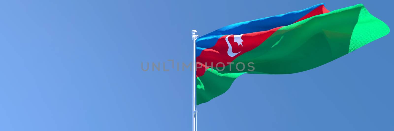 3D rendering of the national flag of Azerbaijan waving in the wind against a blue sky