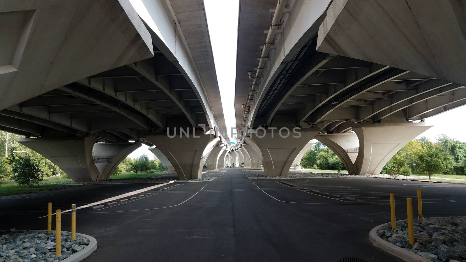 asphalt and rocks underneath the Wilson bridge in Alexandria, Virginia