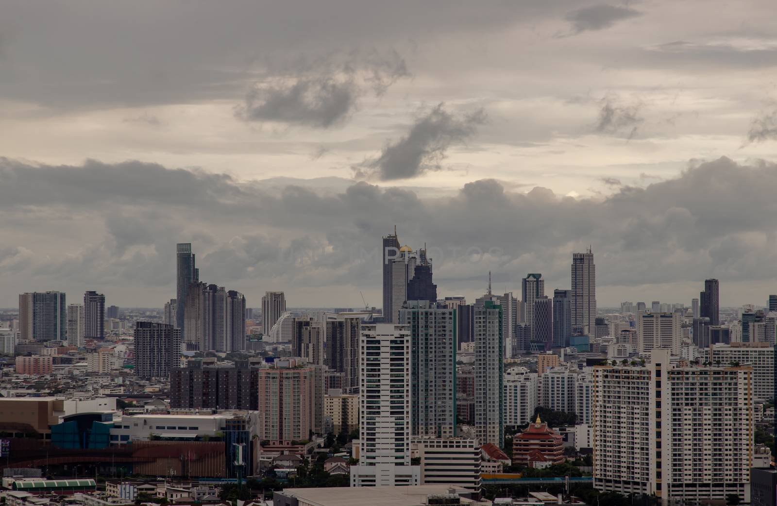 Bangkok downtown cityscape with skyscrapers at evening give the city a modern style. Selective focus.