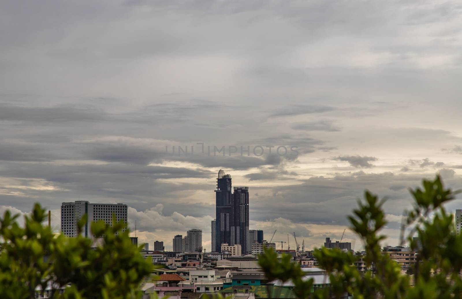 Bangkok downtown cityscape with skyscrapers at evening give the city a modern style. Selective focus.