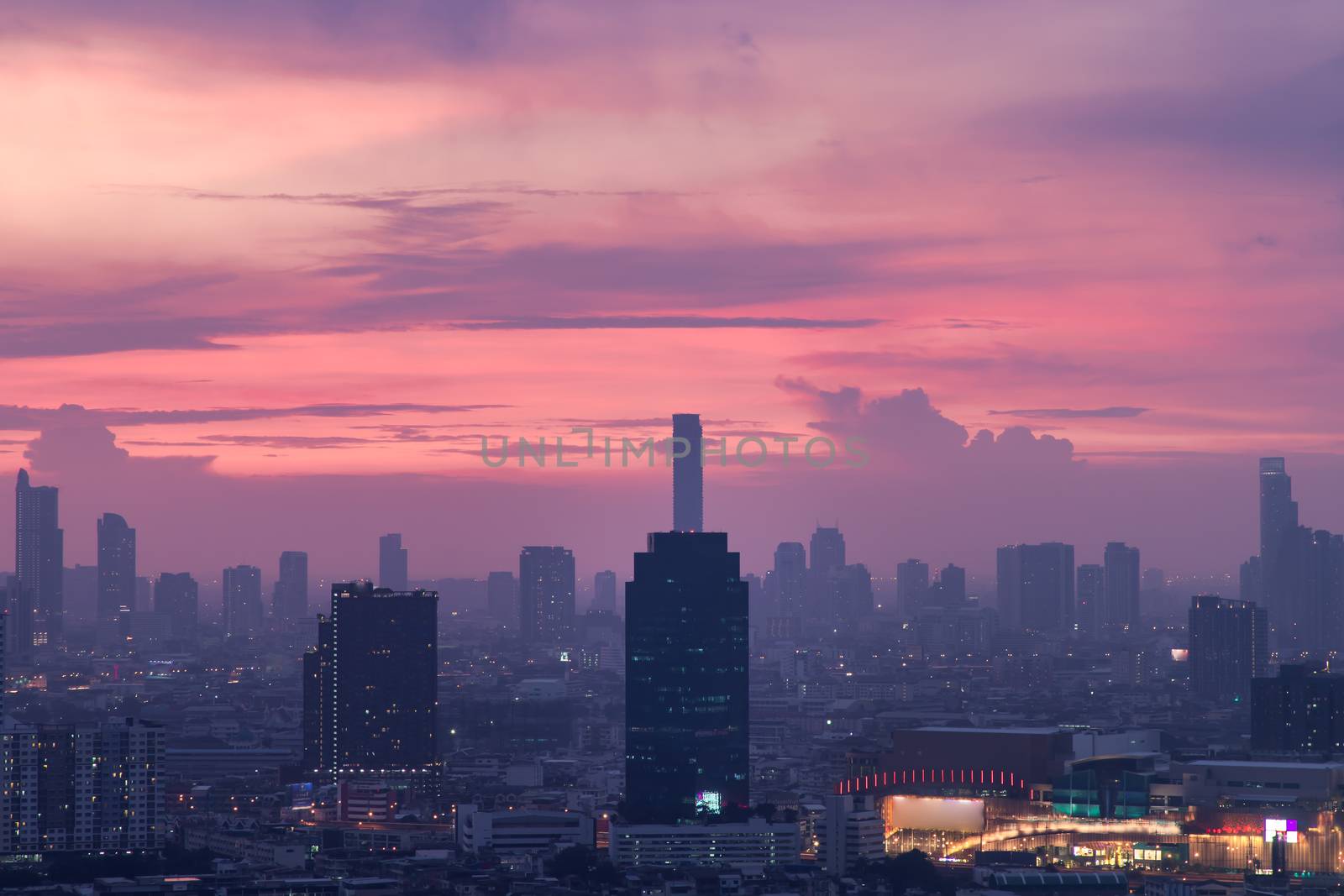 Bangkok downtown cityscape with skyscrapers at evening give the city a modern style. No focus, specifically.