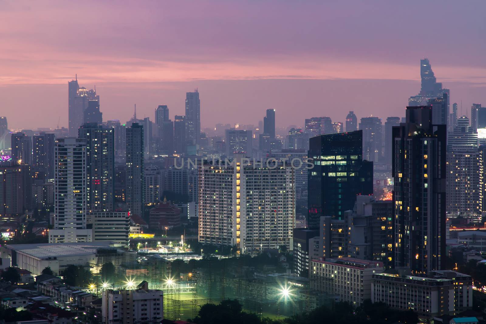 Bangkok downtown cityscape with skyscrapers at evening give the city a modern style. No focus, specifically.