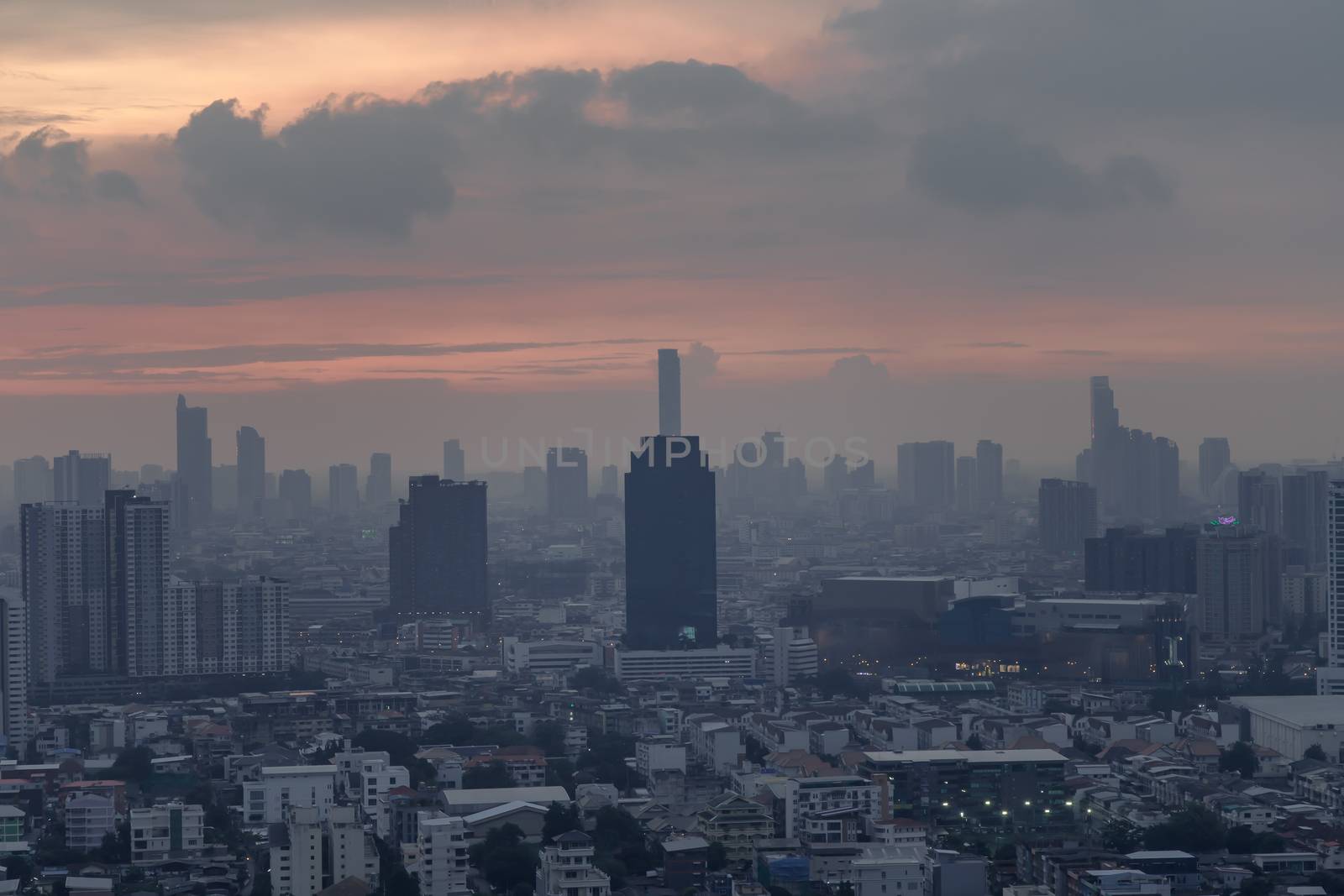 Bangkok downtown cityscape with skyscrapers at evening give the city a modern style. No focus, specifically.