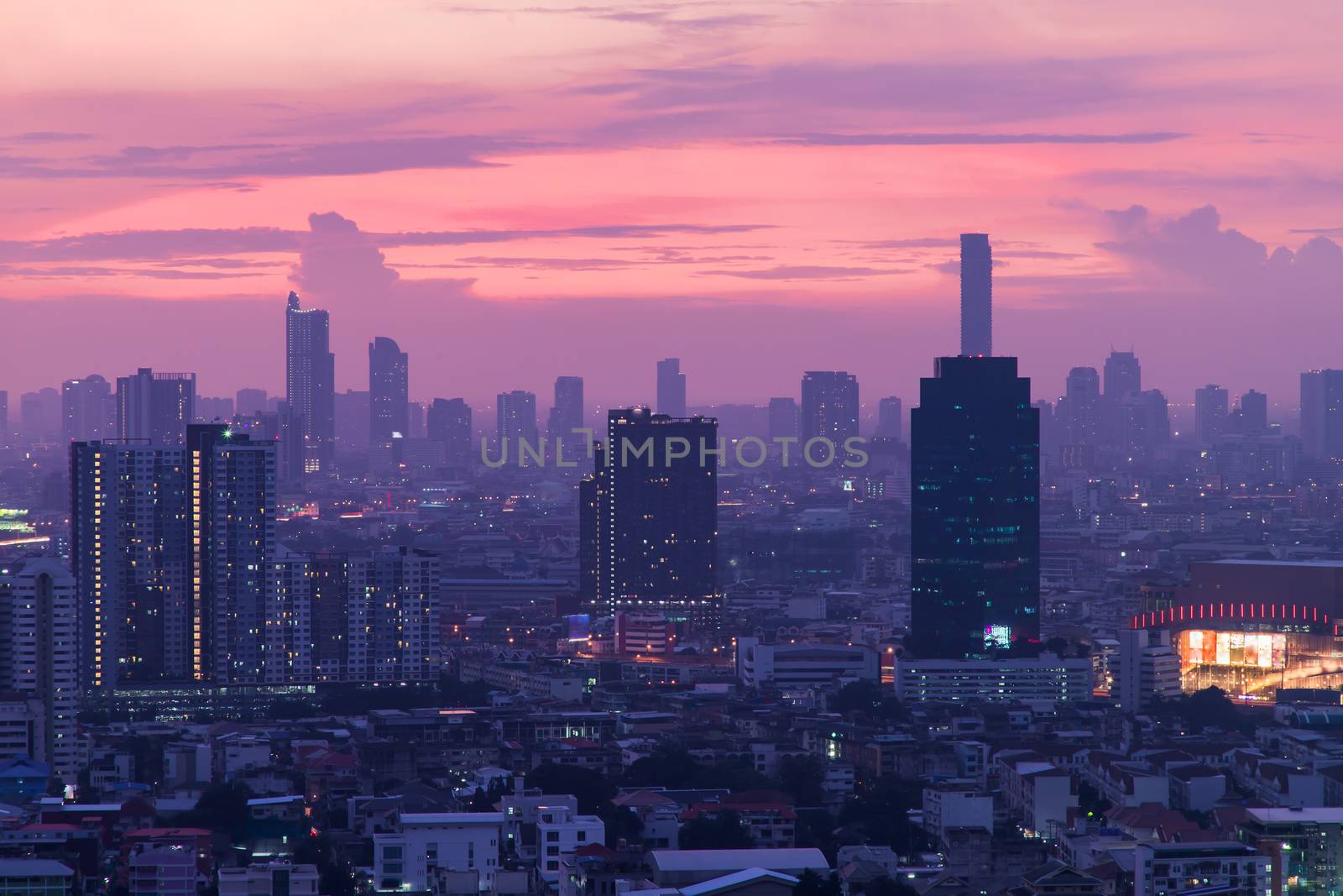 Bangkok downtown cityscape with skyscrapers at evening give the city a modern style. No focus, specifically.