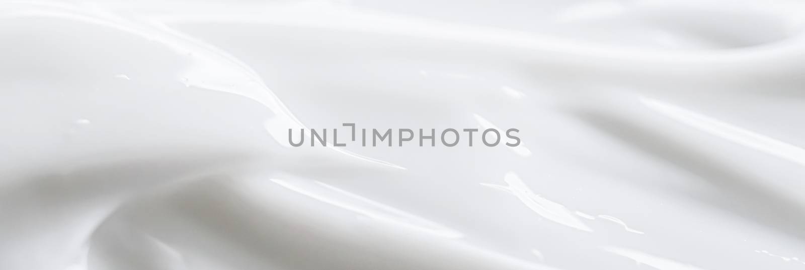 Pure white cream texture as abstract background, food substance or organic cosmetics