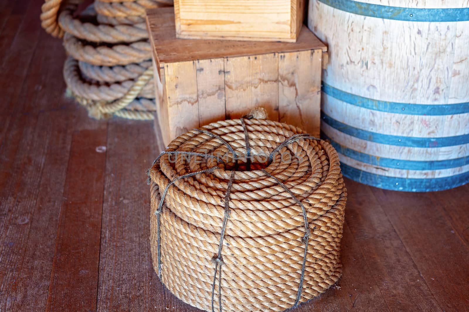 A role of rope, timber boxes and barrel in an old chandler's store at an Australian maritime museum