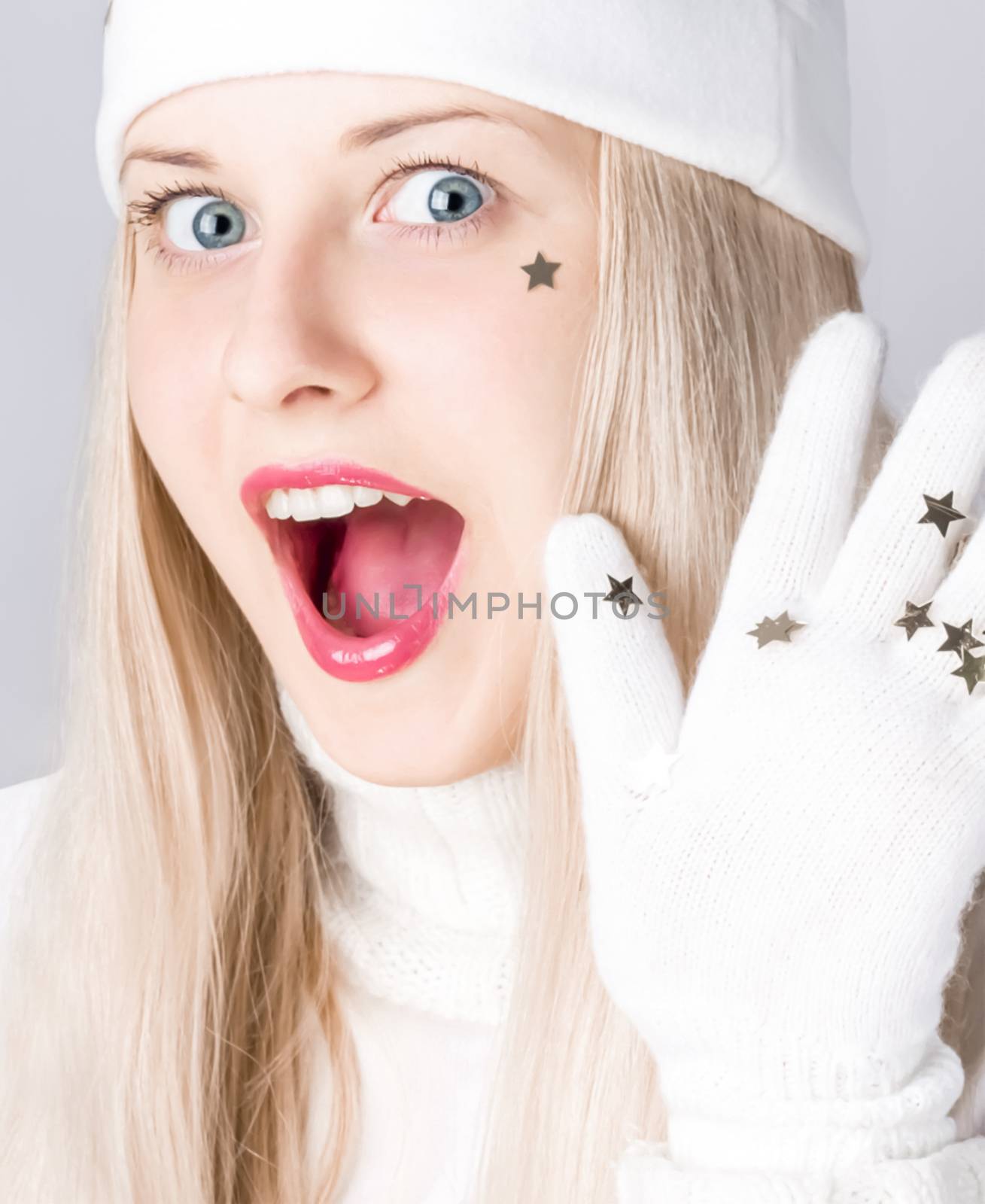 Young woman celebrating Christmas time, happy smiles