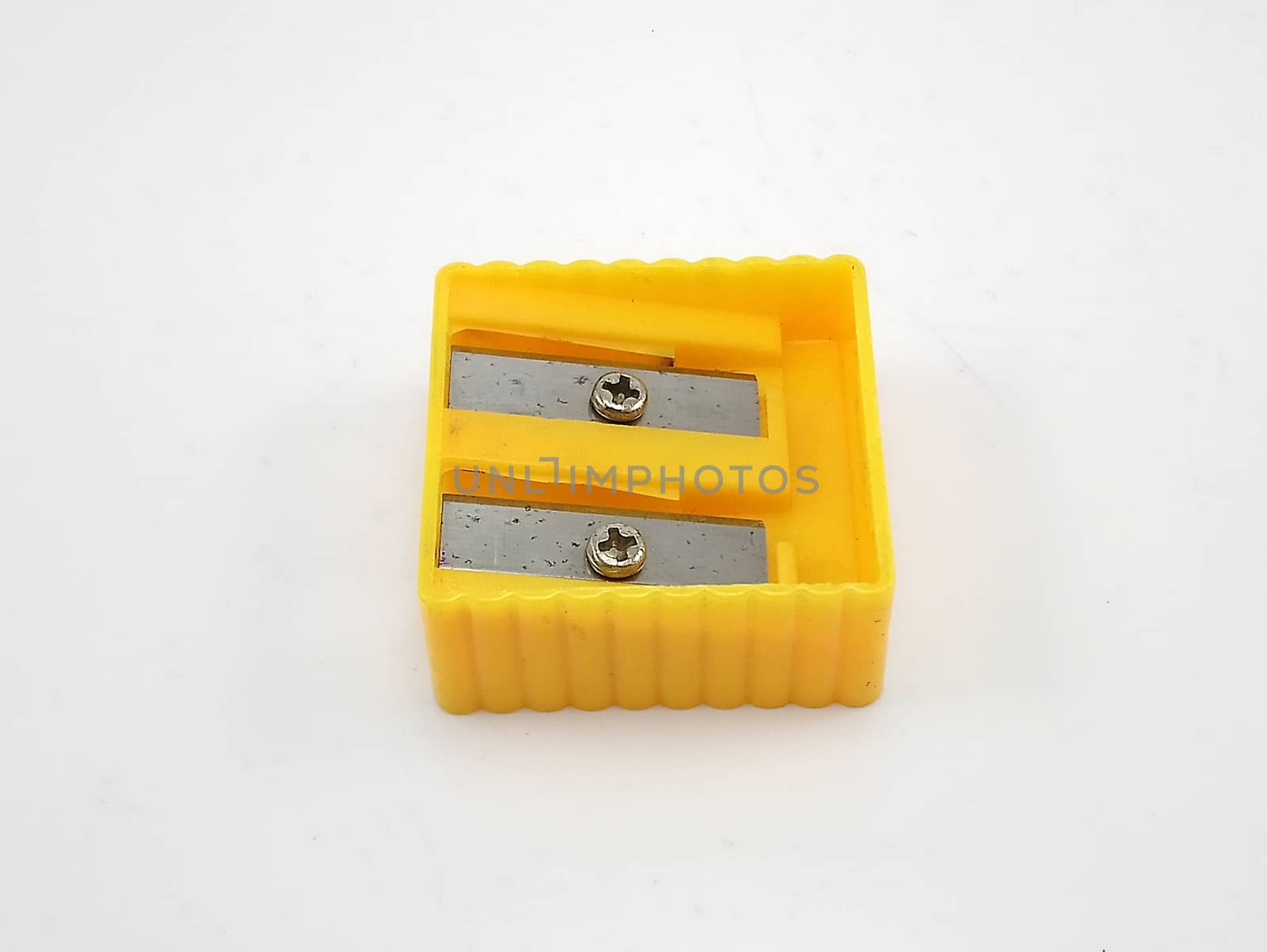 Wood pencil sharpener school supply plastic yellow use to sharpen the tip of pencil