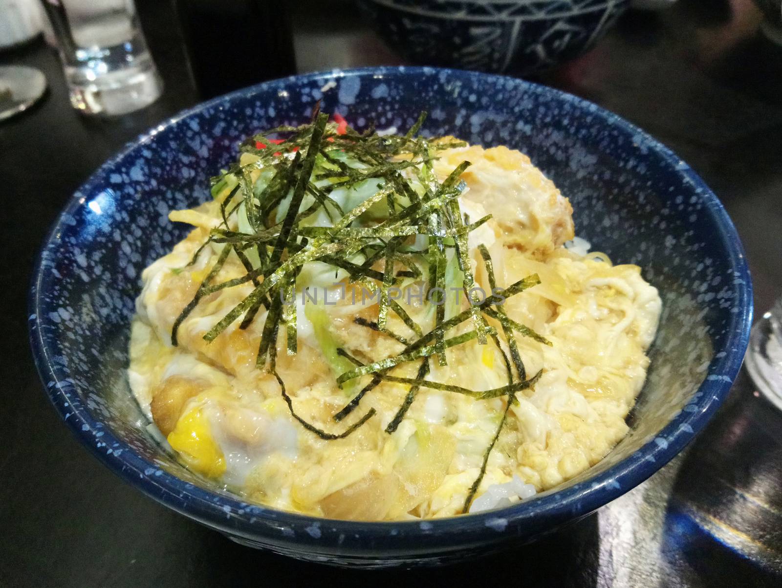 Chicken katsudon with rice place in bowl Japanese cuisine by imwaltersy