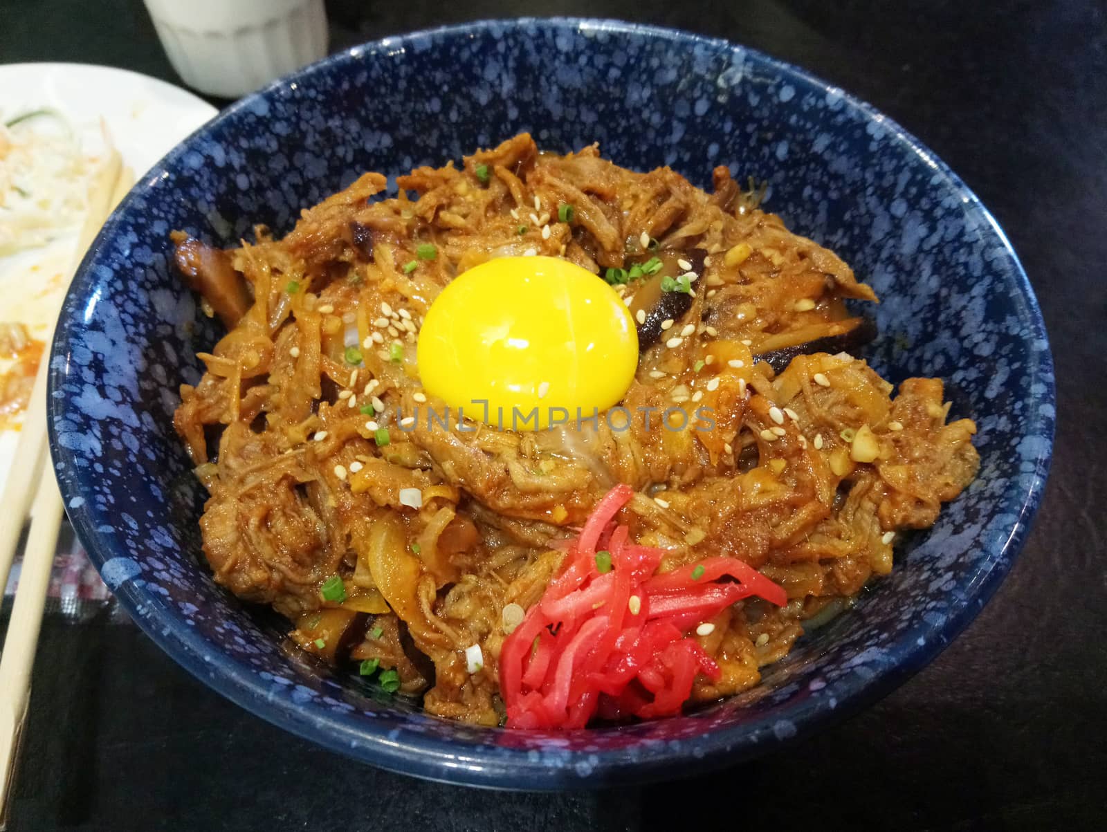Beef gyudon with rice place in bowl Japanese cuisine serve in restaurant