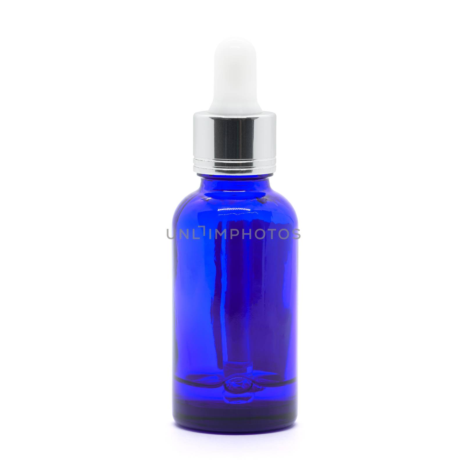 Blue glass dropper serum bottle on white background by stoonn