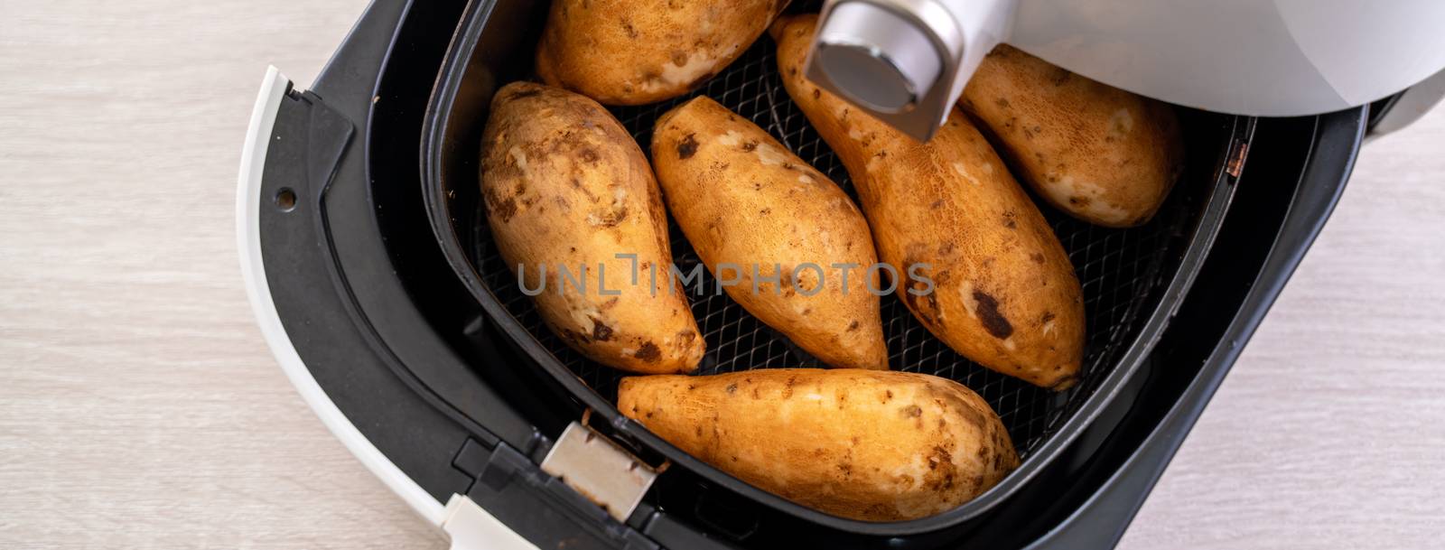 Roasted sweet potato cooked by airfryer at home. Healthy food for diet eating.