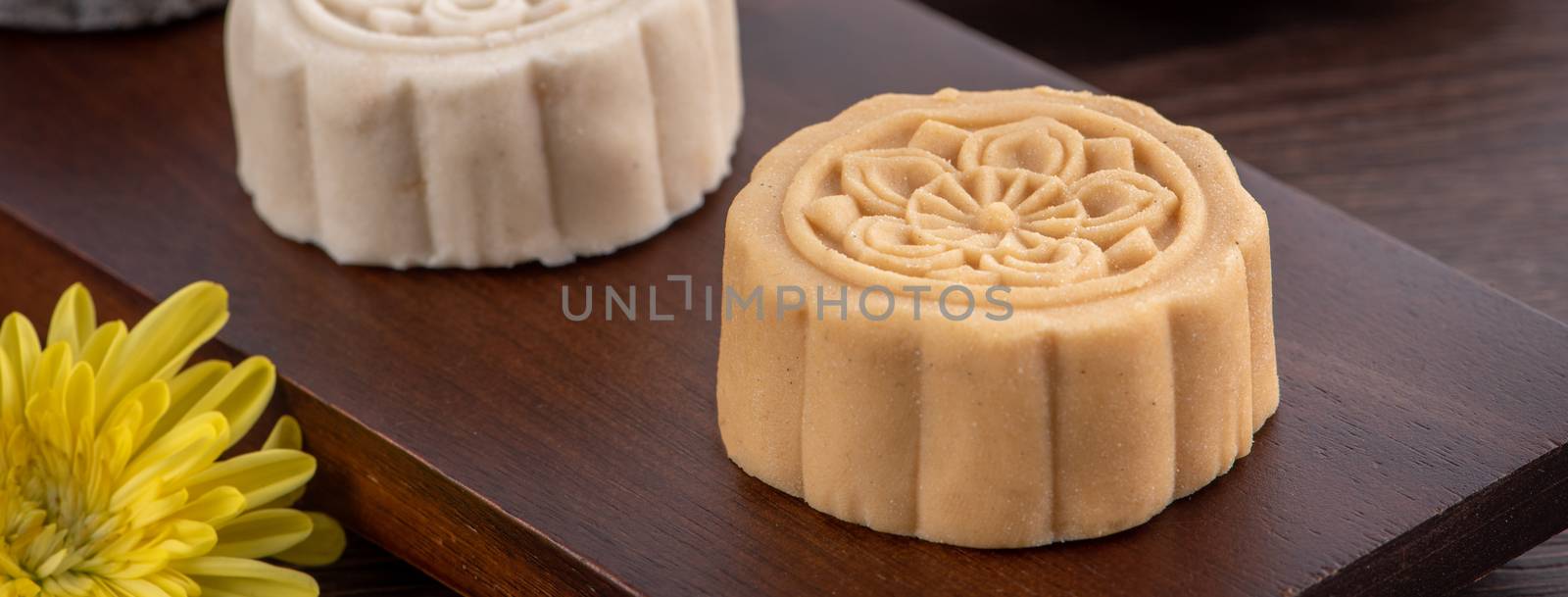 Colorful beautiful moon cake, mung bean cake, Champion Scholar Pastry cake for Mid-Autumn festival traditional gourmet dessert snack, close up.