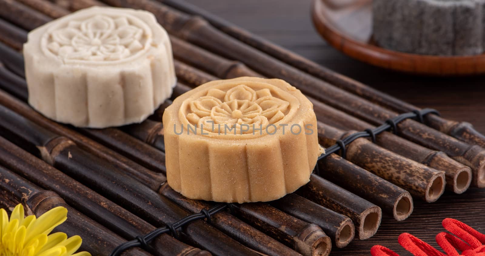 Colorful beautiful moon cake, mung bean cake, Champion Scholar Pastry cake for Mid-Autumn festival traditional gourmet dessert snack, close up.