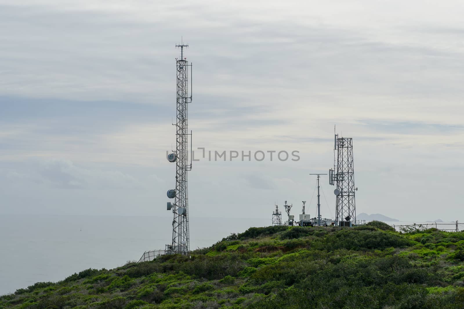 Telecommunication antennas on the top of mountain by Bonandbon