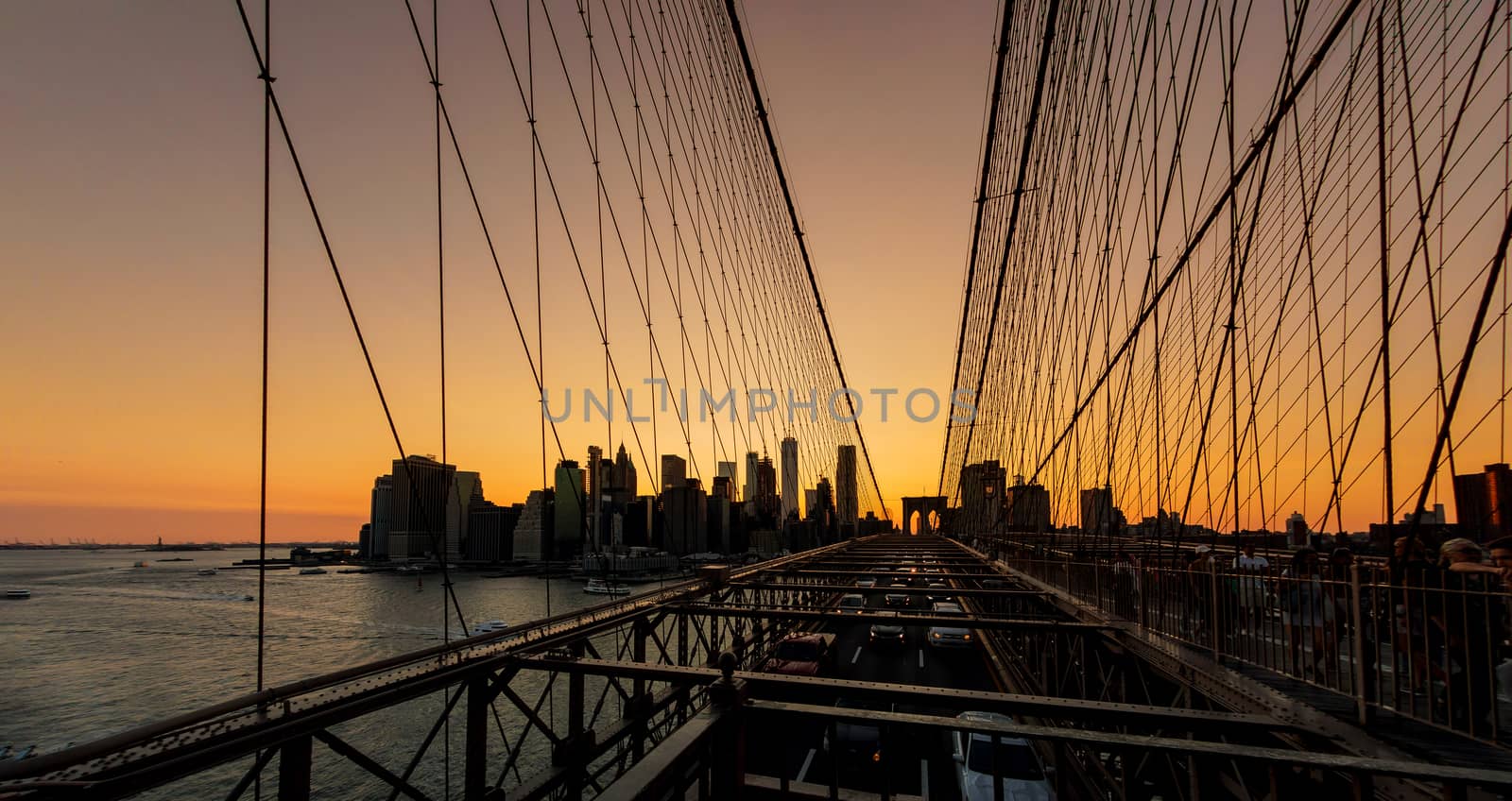 Brooklyn Bridge sunset with Manhattan skyline in New York