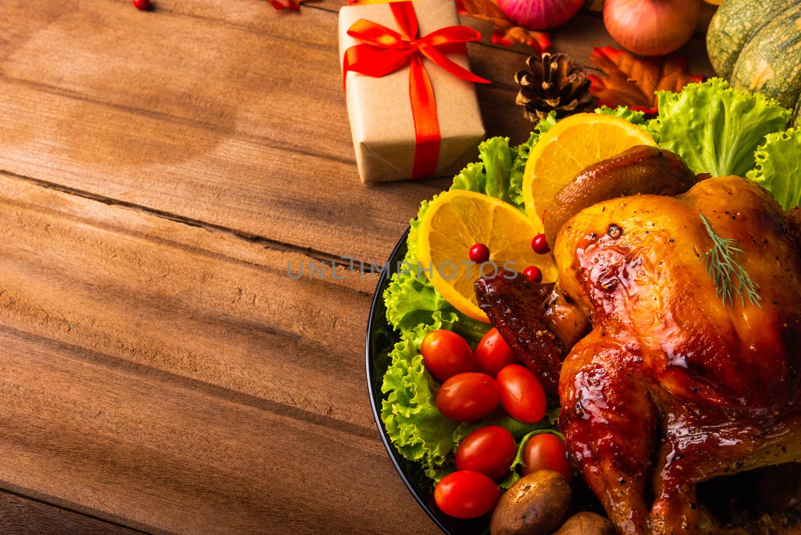 Thanksgiving baked turkey or chicken and vegetables, Christmas dinner feast food decoration, studio shot on wooden table background, Happy thanksgiving day of holiday concept