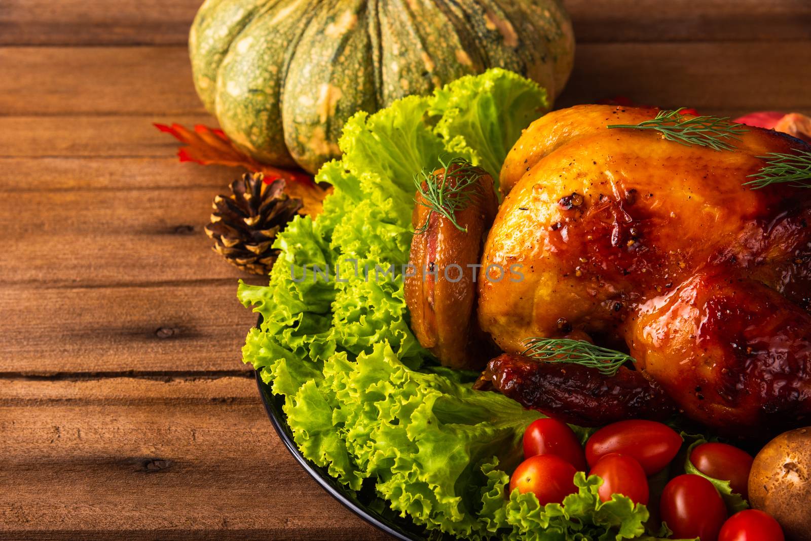 Thanksgiving baked turkey or chicken and vegetables, Christmas dinner feast food decoration, studio shot on wooden table background, Happy thanksgiving day of holiday concept