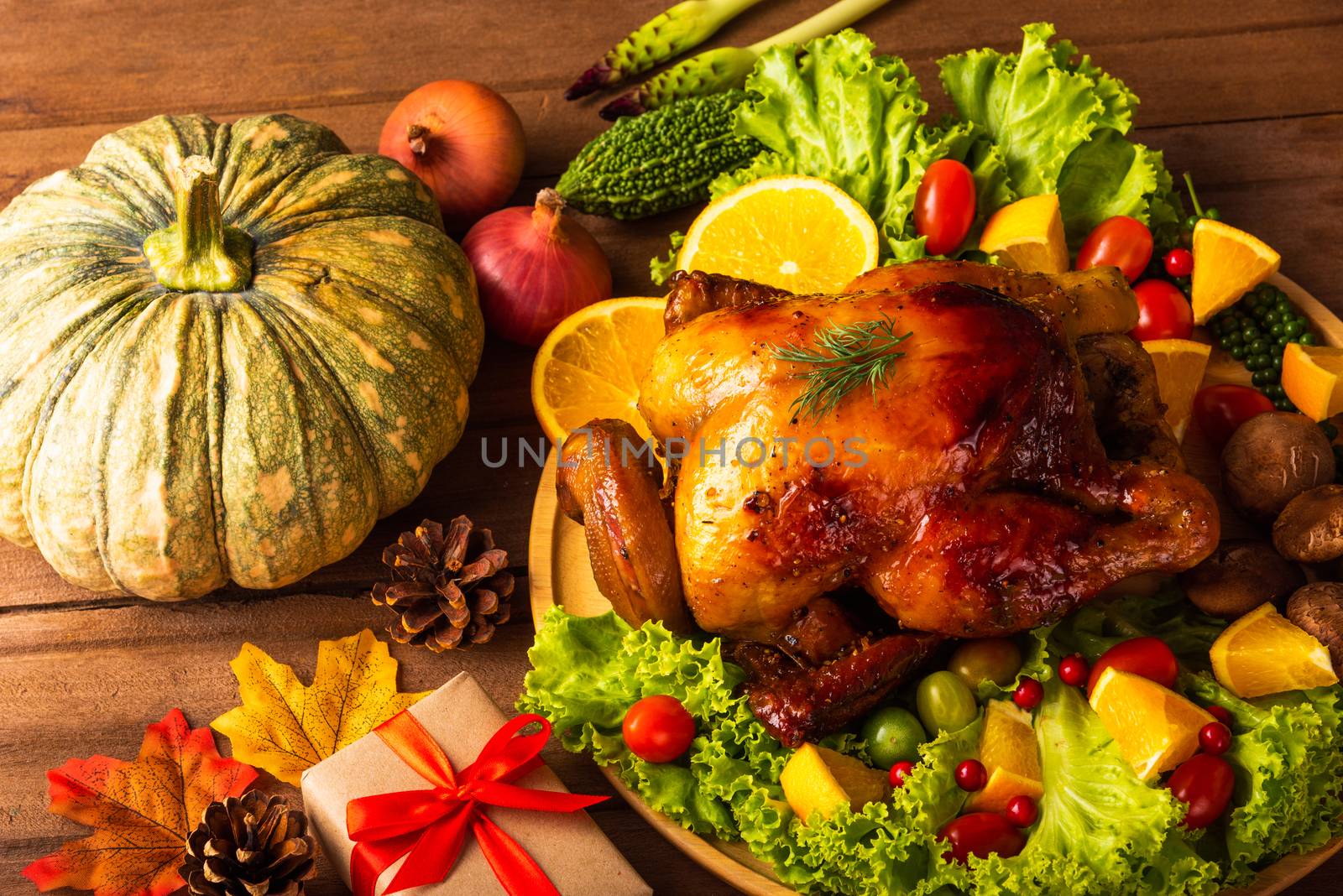 Thanksgiving roasted turkey or chicken and vegetables, Top view Christmas dinner feast food decoration traditional homemade on wooden table background, Happy thanksgiving day of holiday concept