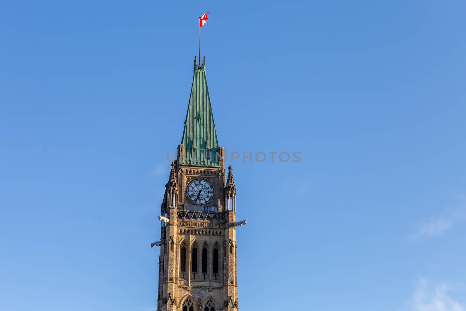 Peace Tower against a blue sky in Ottawa, Canada by colintemple