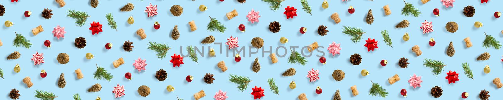 modern christmas background on blue backdrop. creative flat lay for christmas time, banners, posters, prints and other creative works. not seamless pattern